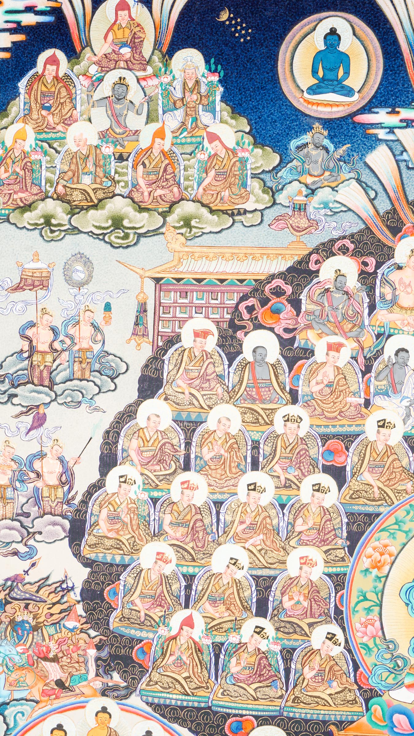 Large traditional Tibetan thangka depicting a detailed Buddhist cosmological assembly, with Vajradhara at the center surrounded by numerous Buddhas, bodhisattvas, lineage masters, and symbolic figures arranged in a complex, symmetrical composition.