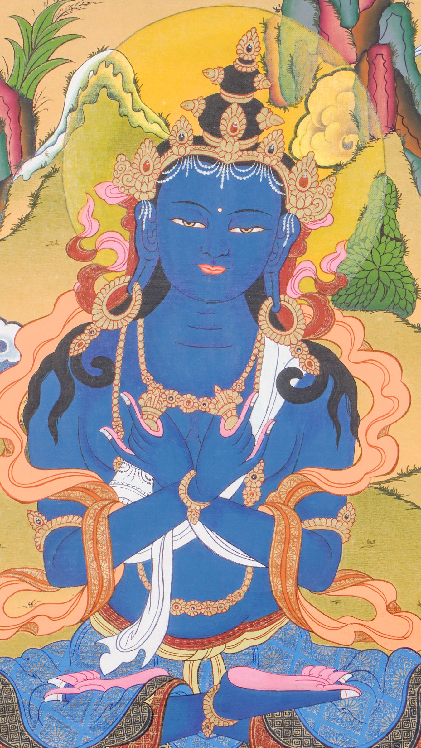 Traditional Tibetan thangka painting depicting Vajradhara, a blue-skinned primordial Buddha seated in meditation on a lotus throne, holding ritual symbols, with clouds, mountains, and a serene natural landscape in the background.
