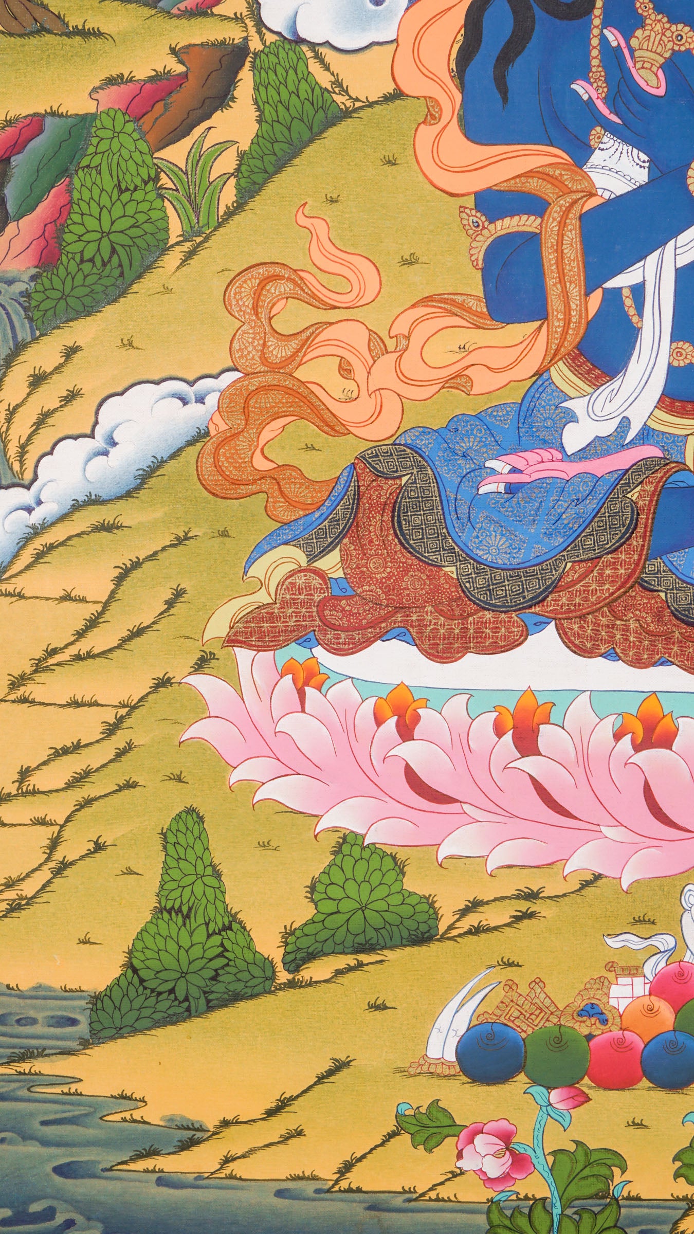 Traditional Tibetan thangka painting depicting Vajradhara, a blue-skinned primordial Buddha seated in meditation on a lotus throne, holding ritual symbols, with clouds, mountains, and a serene natural landscape in the background.