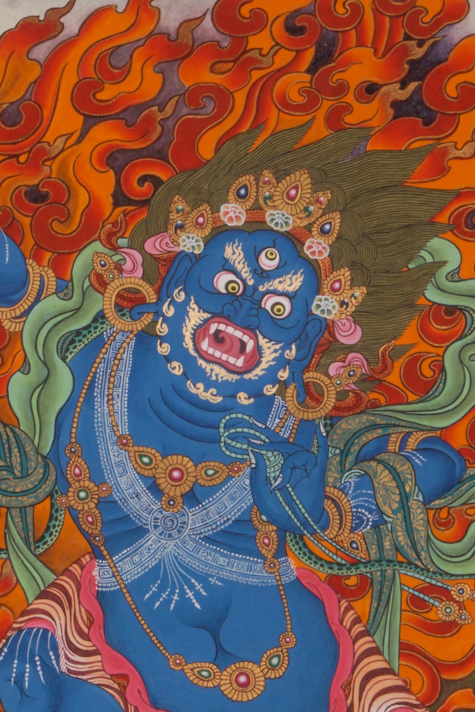 This genuine Vajrapani Thangka embodies strength, courage, and spiritual protection, hand-painted with natural mineral pigments by skilled artisans. A powerful focal point for meditation or sacred display, it invites Vajrapani's energy of transformation and inner fortitude into your space.