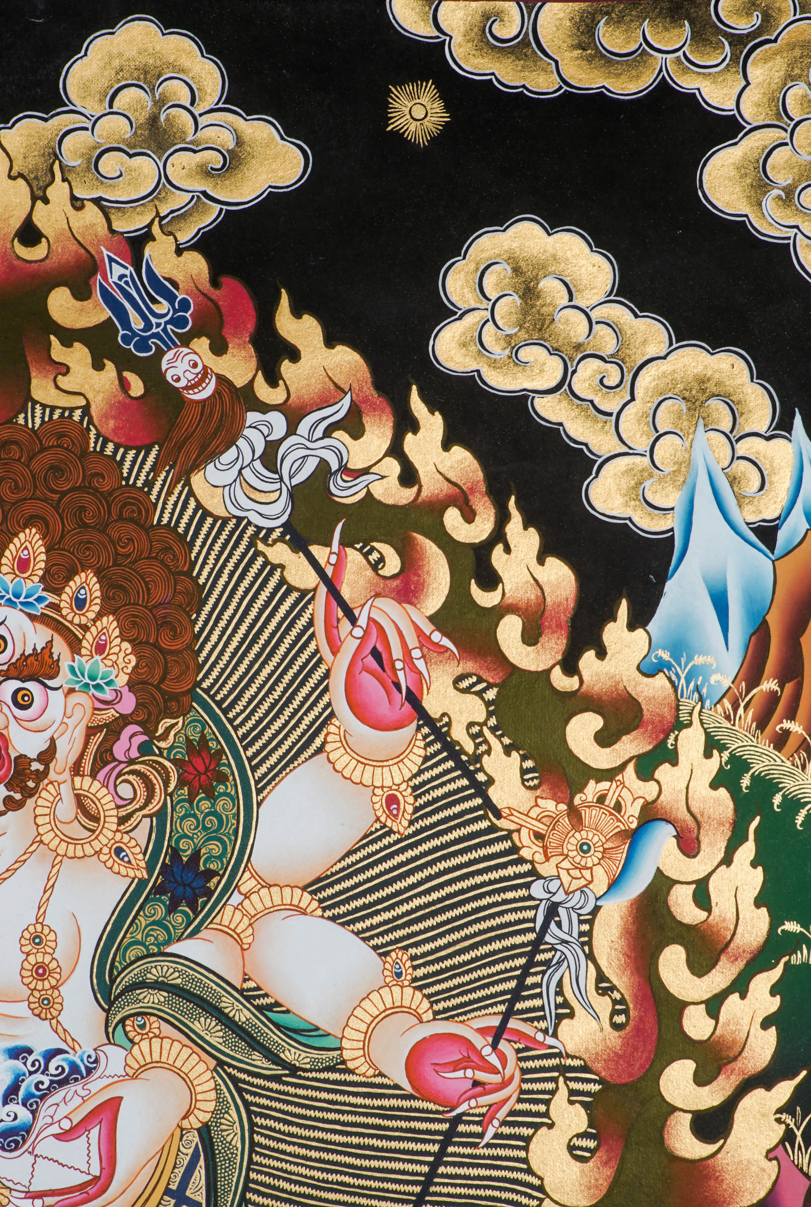 A sacred hand-painted art with 24k gold and natural pigments of a fierce protector form of the Buddha of compassion.