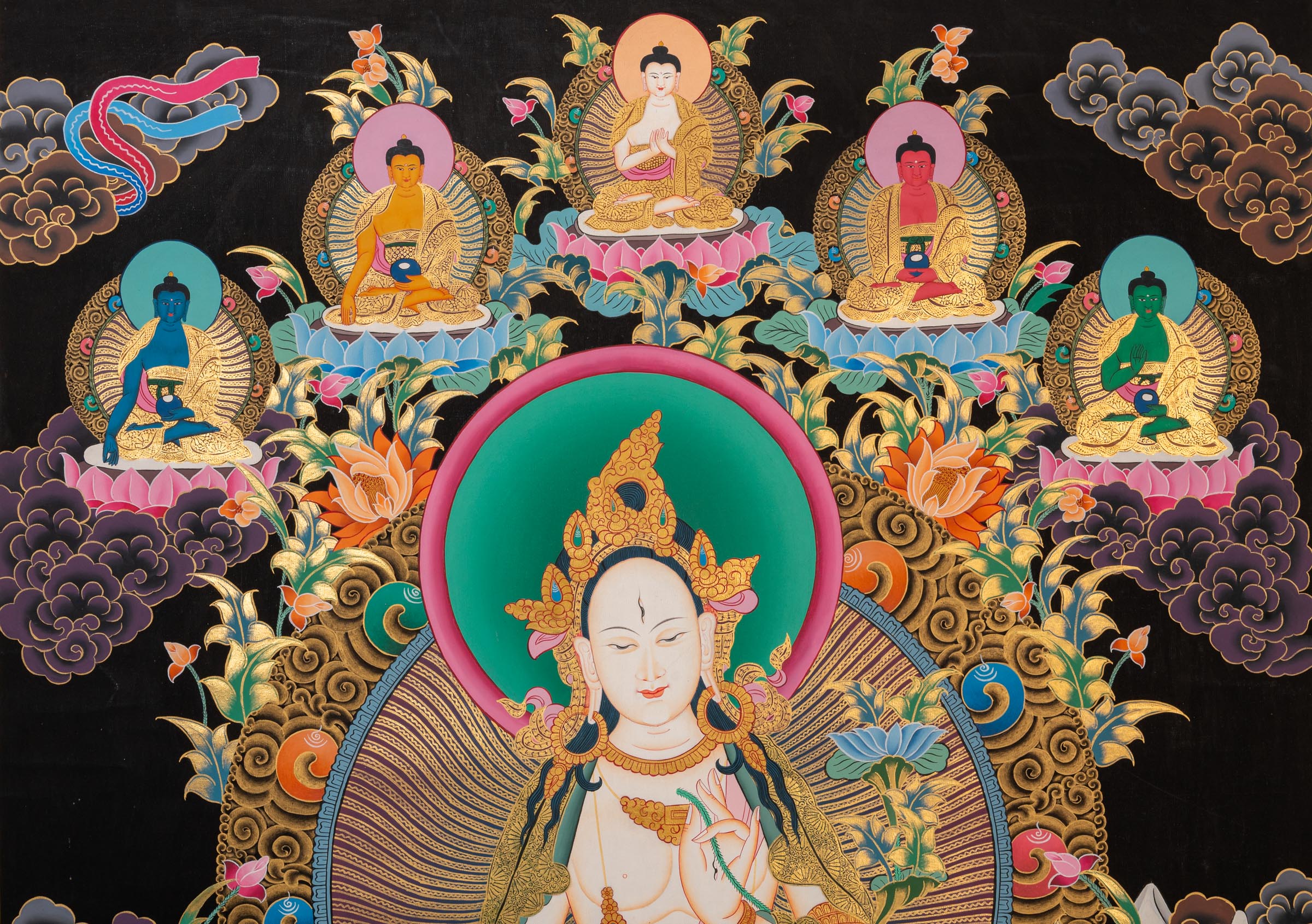White Tara Thangka - a colorful depiction of a central figure with ornate surroundings