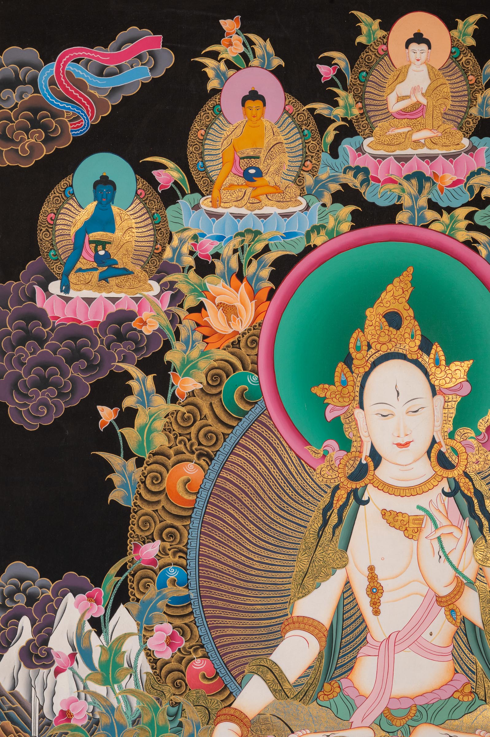 White Tara Thangka - a colorful depiction of a central figure with ornate surroundings