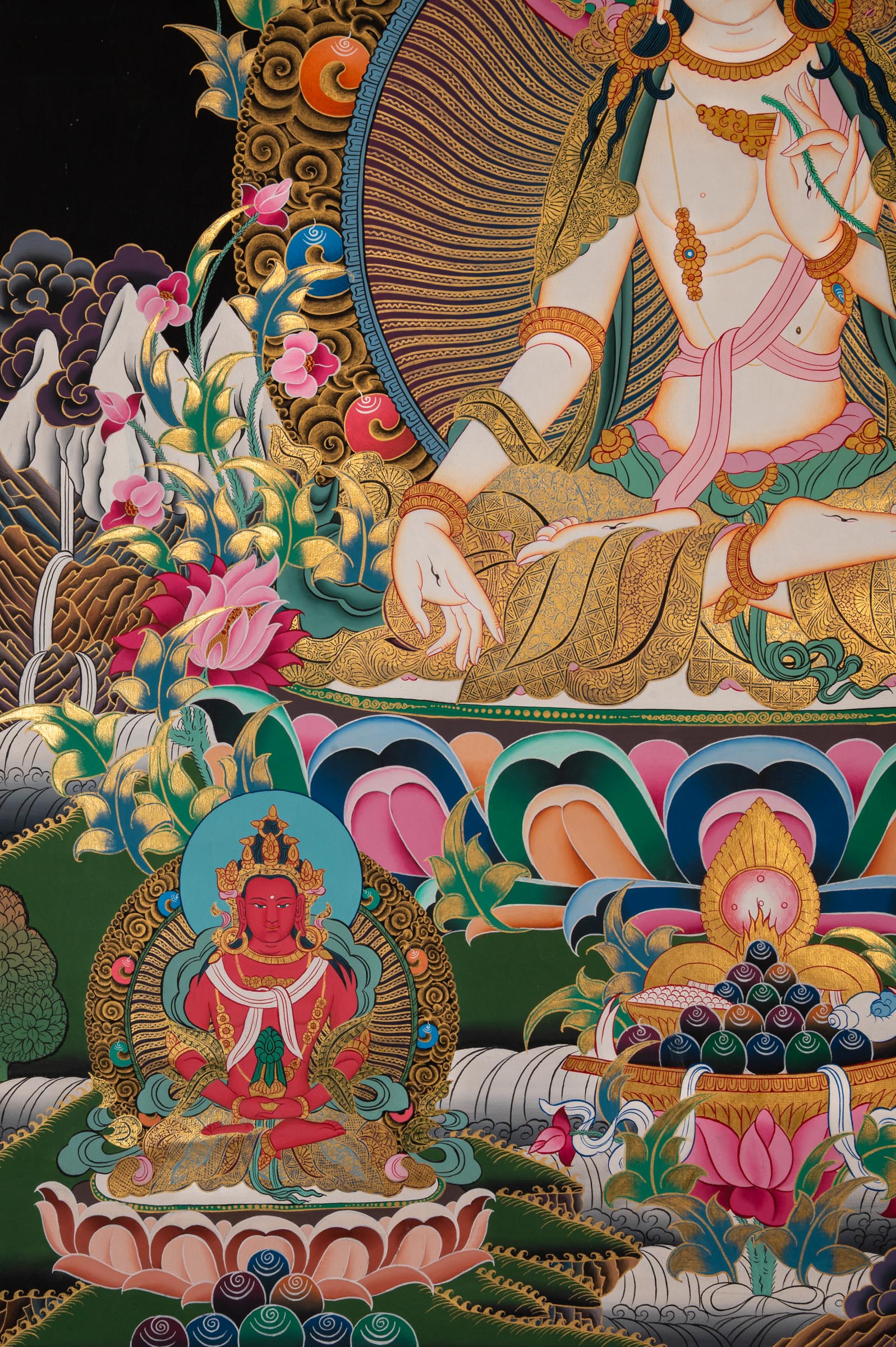 White Tara Thangka - a colorful depiction of a central figure with ornate surroundings