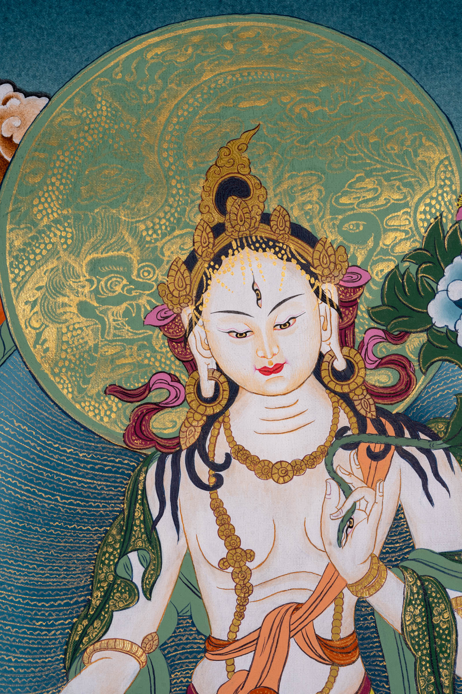 The White Tara Thangka Painting is a ideal for invoking tranquility and enlightenment in your home or sacred space.