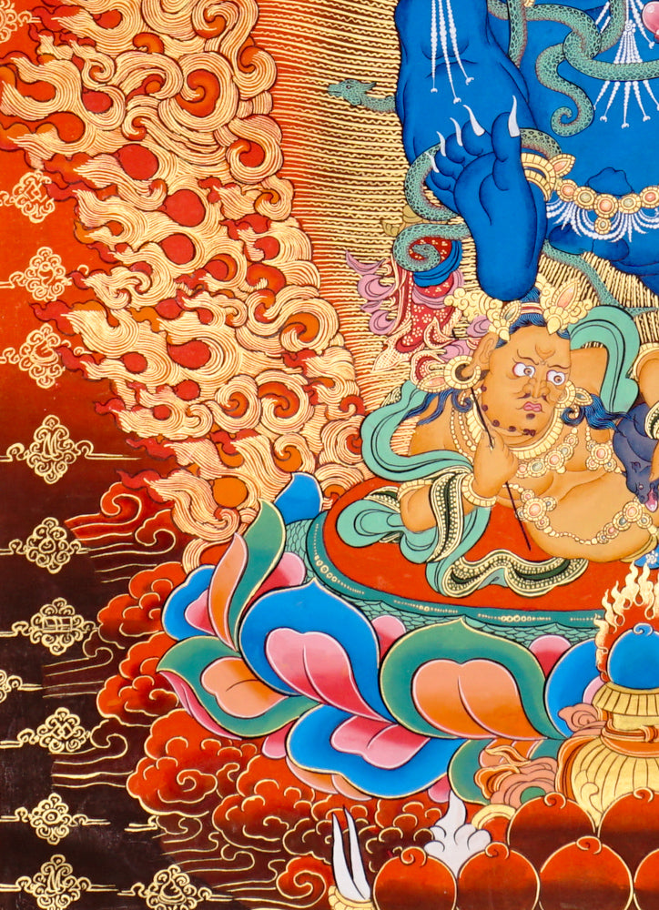 Hand-painted Black Zambhala thangka showing wrathful blue deity with flames, mongoose, and skull cup.