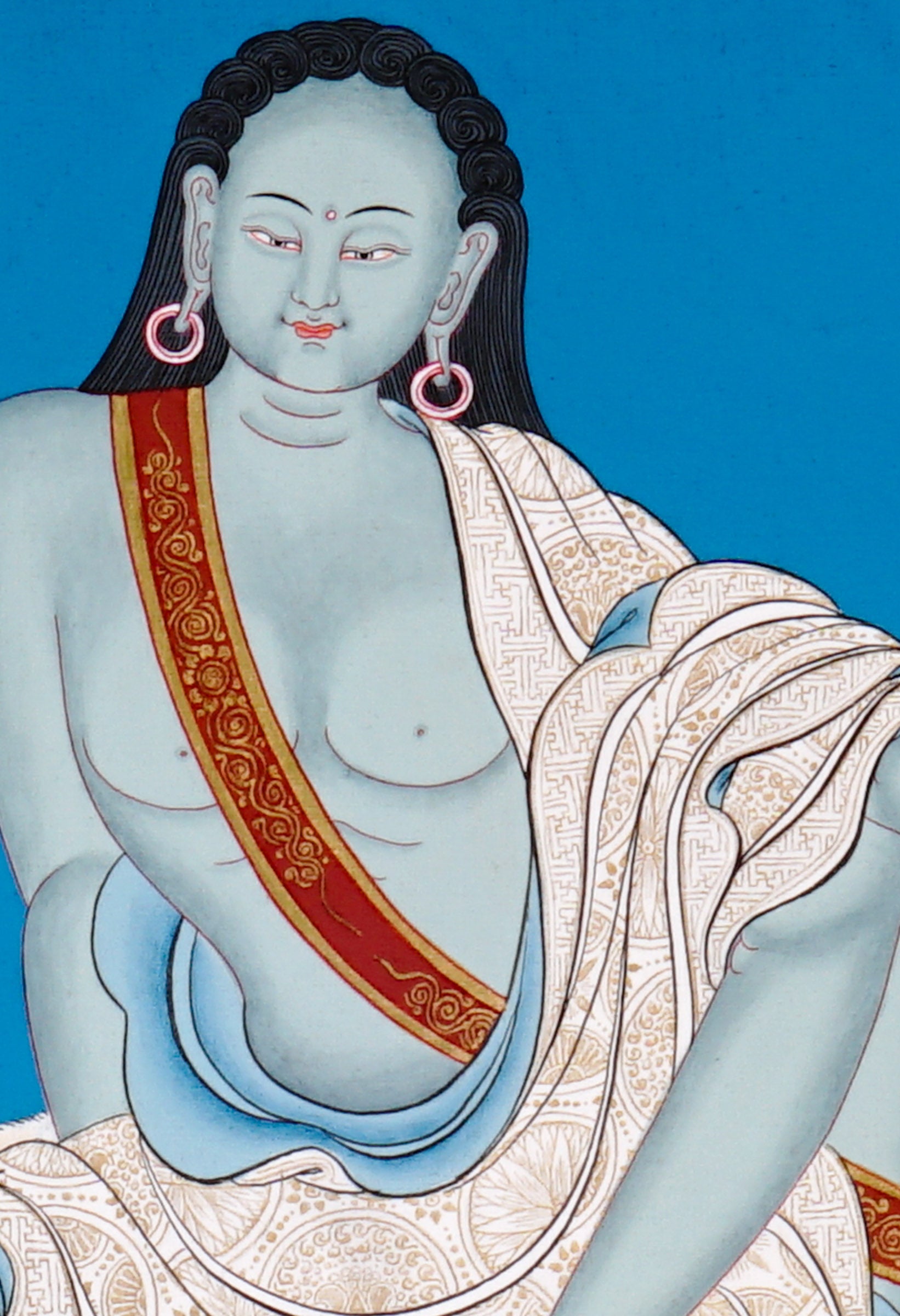 Hand-painted Milarepa thangka with blue background, deer skin seat, skull cup, and raised listening gesture, traditional Tibetan Buddhist art.