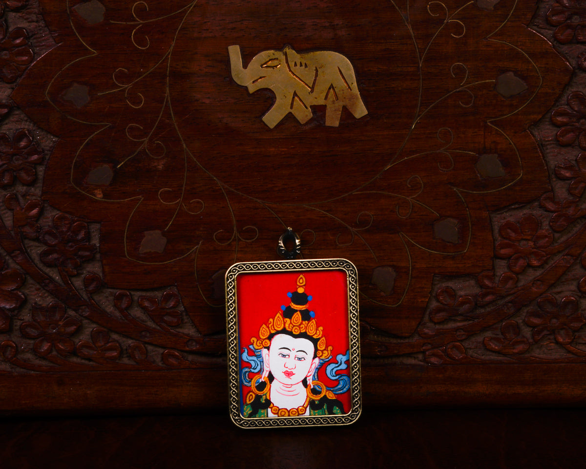 Vajrasattva Ghau pendant in an antique-style metal frame featuring a miniature Tibetan Buddhist painting handcrafted in Nepal.