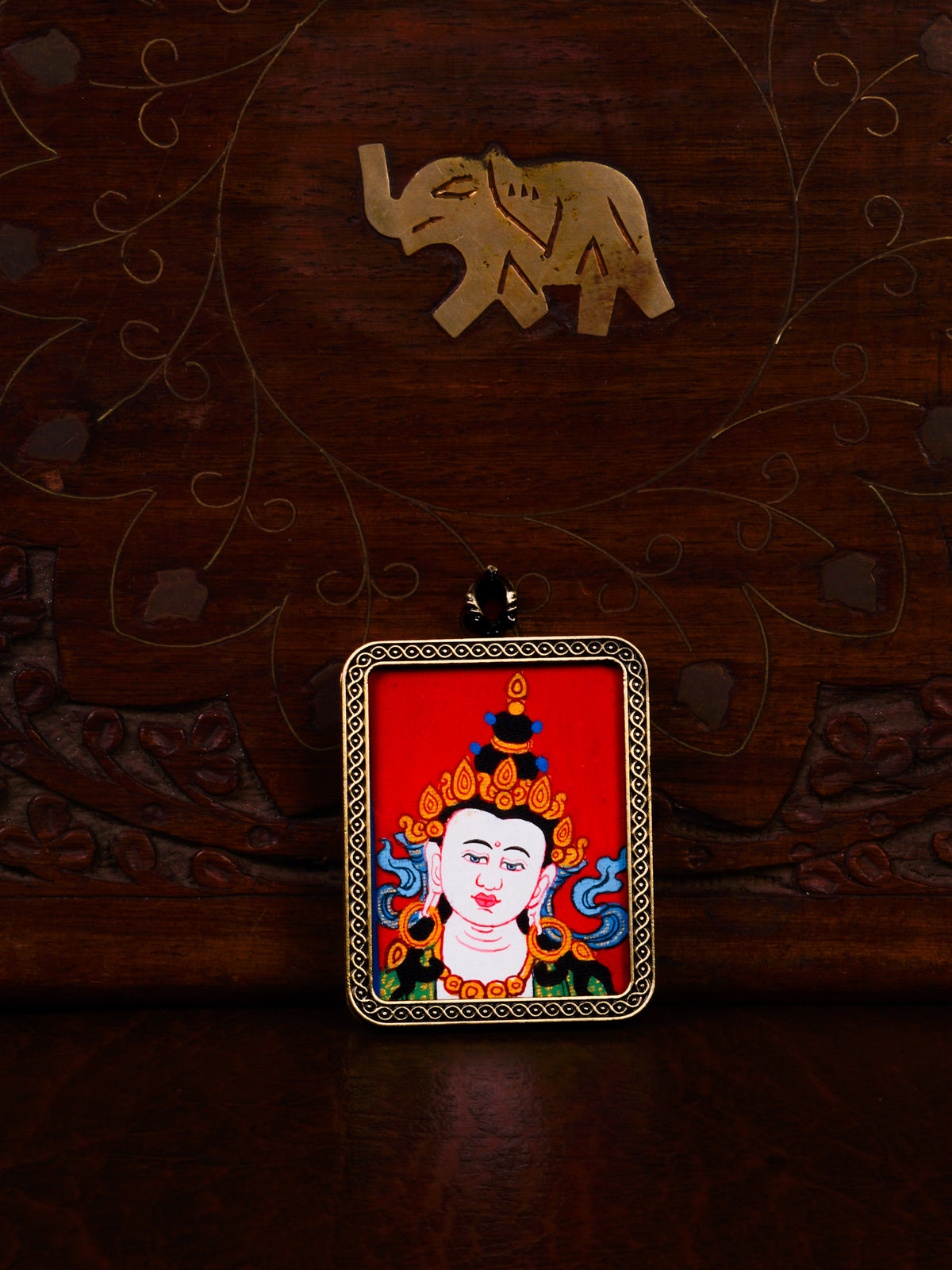Vajrasattva Ghau pendant in an antique-style metal frame featuring a miniature Tibetan Buddhist painting handcrafted in Nepal.