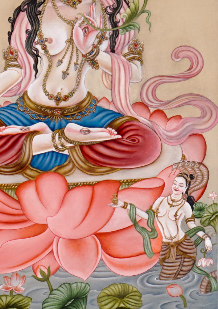 Hand-painted Newari White Tara thangka showing the Buddhist goddess of compassion seated on a lotus throne holding a utpala flower.