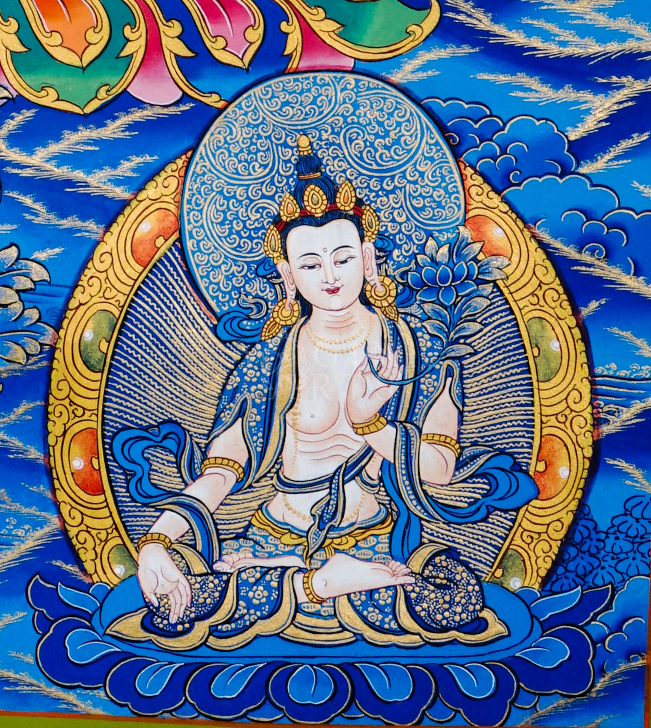 Tibetan thangka of White Tara seated on a lotus throne with seven eyes of wisdom, surrounded by attendant forms, hand-painted with traditional Himalayan Buddhist iconography