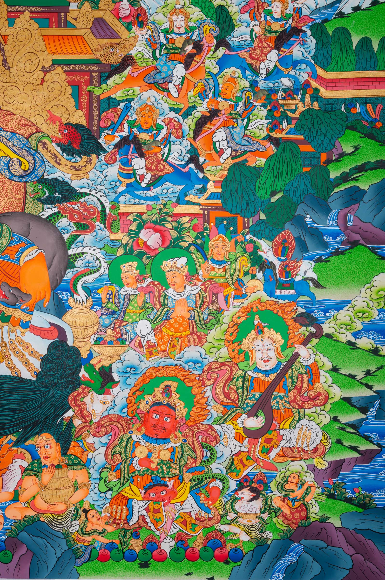Tibetan Buddhist thangka painting of Zambala (Dzambhala), the deity of wealth and prosperity, depicted in royal posture holding a jewel-spouting mongoose and a treasure vase, seated amid a richly detailed paradise landscape with palatial architecture, snow mountains, flowing rivers, and numerous attendant deities and guardians, finely hand-painted in traditional Tibetan style using vibrant mineral pigments.