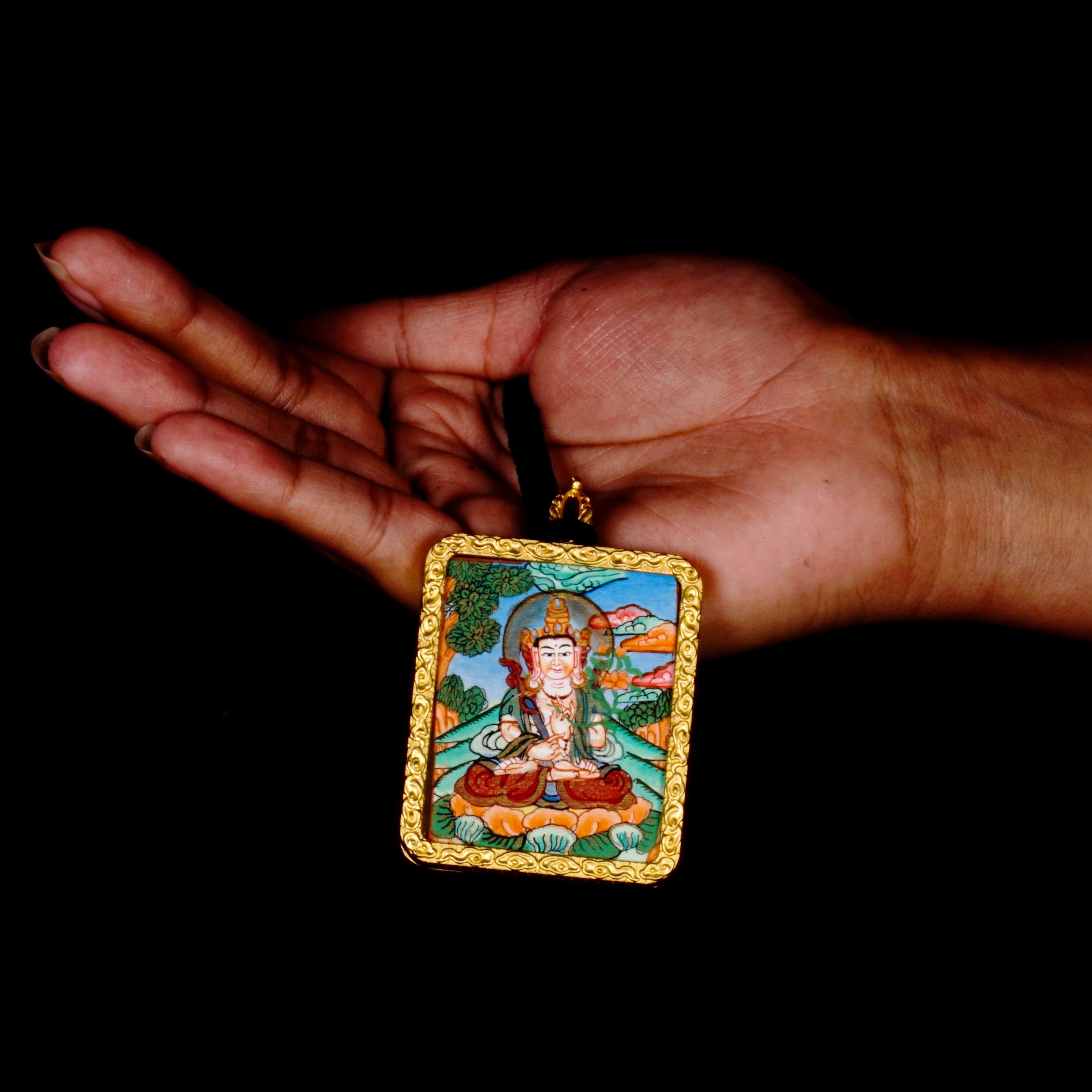 Hand-painted Fushen Fusa Bodhisattva miniature Thangka pendant in gold-accented copper Ghau locket with black beaded cord.
