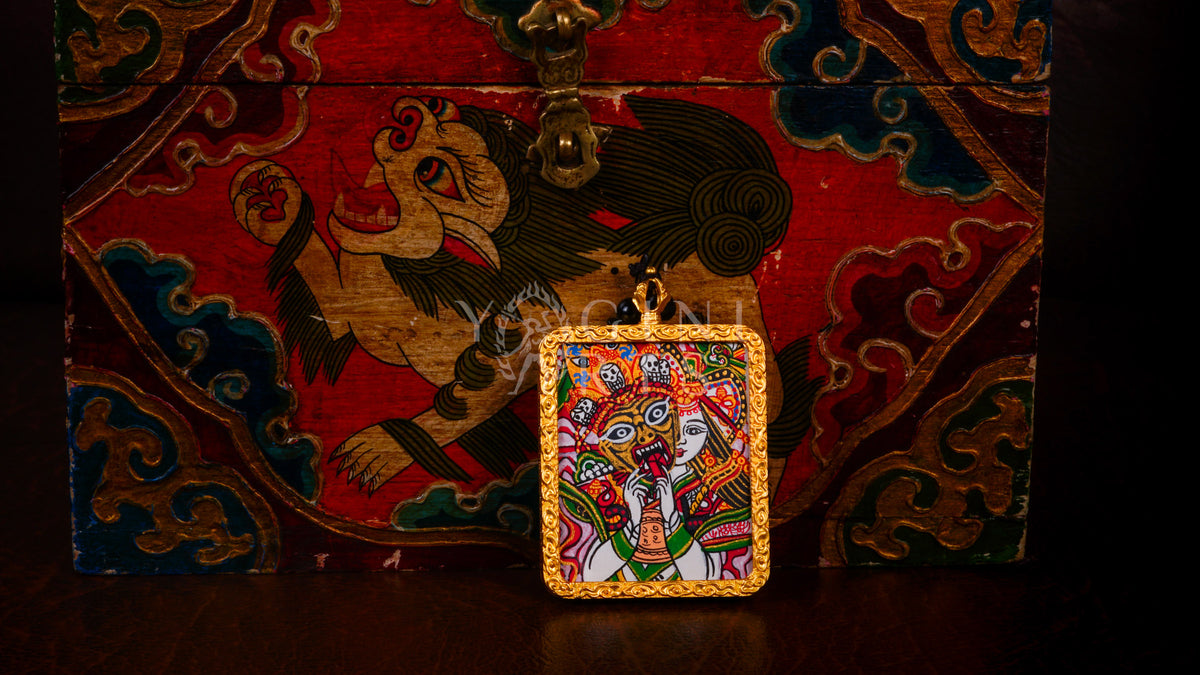 Hand-painted Zhaji Lhamo Ghau pendant in a gold-tone frame, handcrafted in Nepal using traditional Himalayan miniature painting techniques.