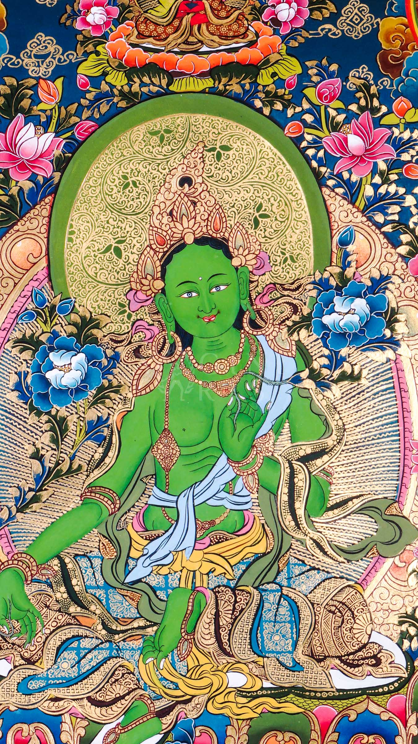 Traditional hand-painted Green Tara Tibetan thangka featuring the Buddhist goddess of compassion seated among lotus flowers with celestial Buddhas and sacred Himalayan motifs