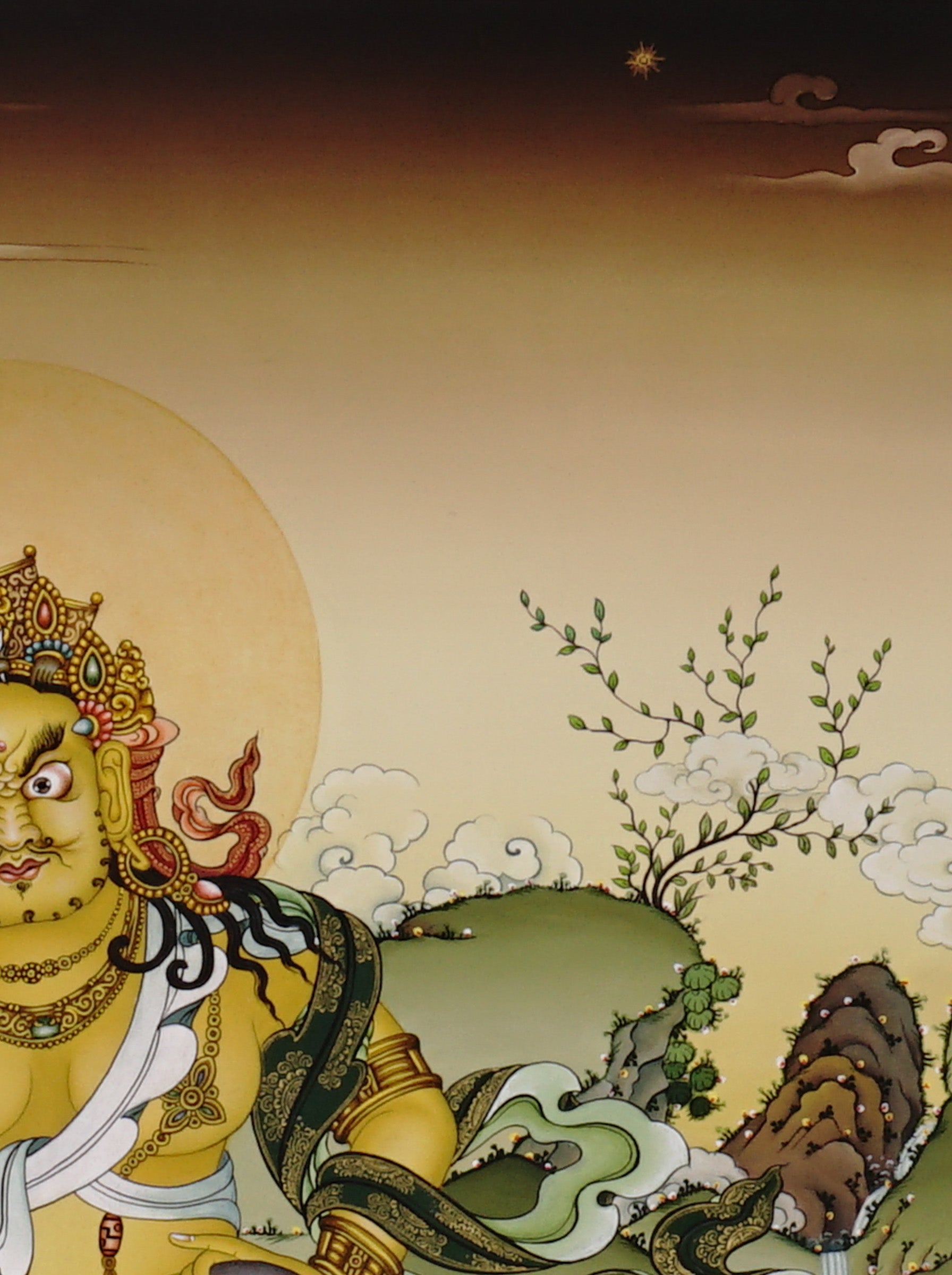 Hand-painted Yellow Dzambhala thangka showing Tibetan wealth deity seated on lotus throne holding mongoose and citron, with gold detailing and Himalayan landscape background.