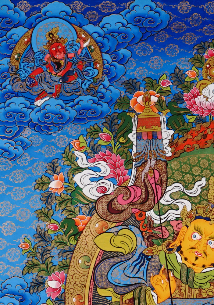 Hand-painted Singh Zambhala thangka with blue background, showing wealth deity riding snow lion and holding mongoose.