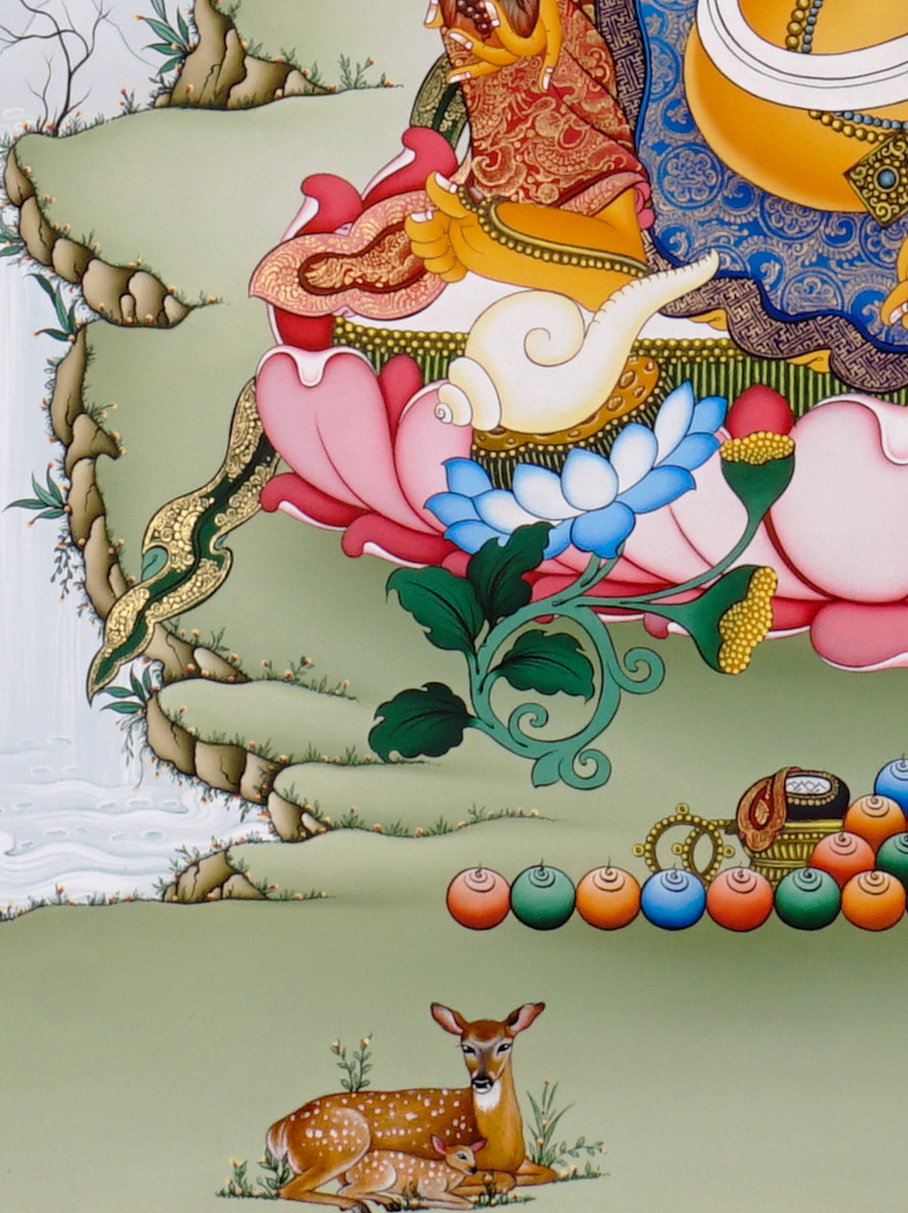 Hand-painted Yellow Dzambhala thangka showing Tibetan wealth deity seated on lotus throne holding mongoose and citron with gold detailing and Himalayan landscape background.