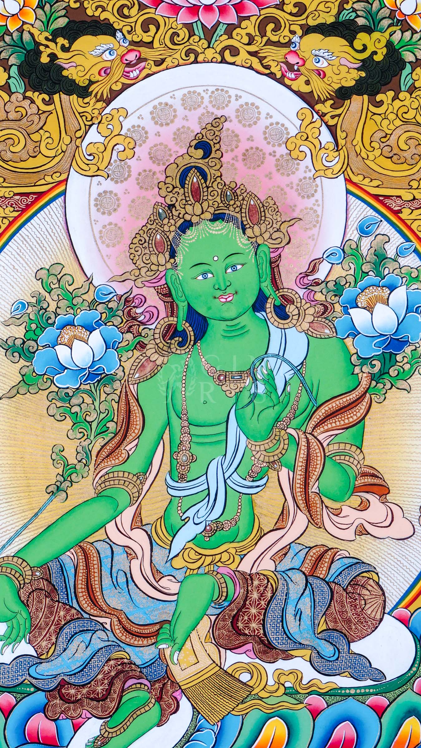 Green Tara seated on a lotus throne surrounded by floral ornamentation, sacred Buddhist symbolism, and traditional Himalayan decorative motifs.