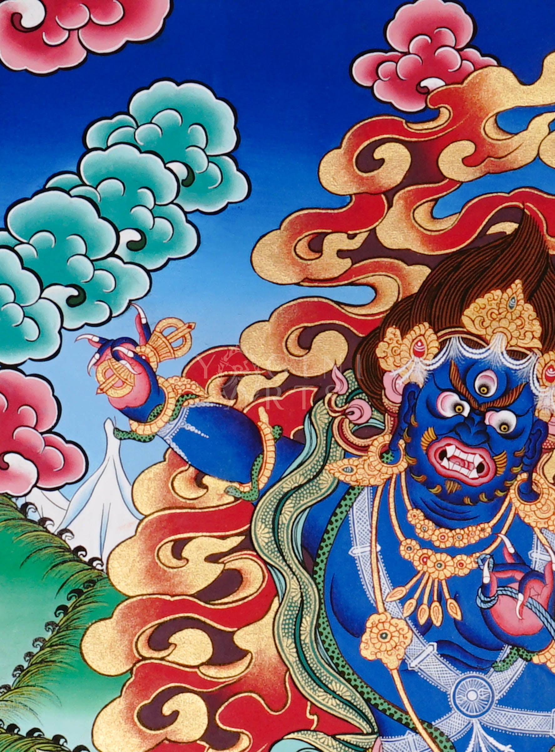 Vajrapani thangka showing a blue wrathful deity holding a vajra, surrounded by flames, standing dynamically on a lotus base in traditional Tibetan style.