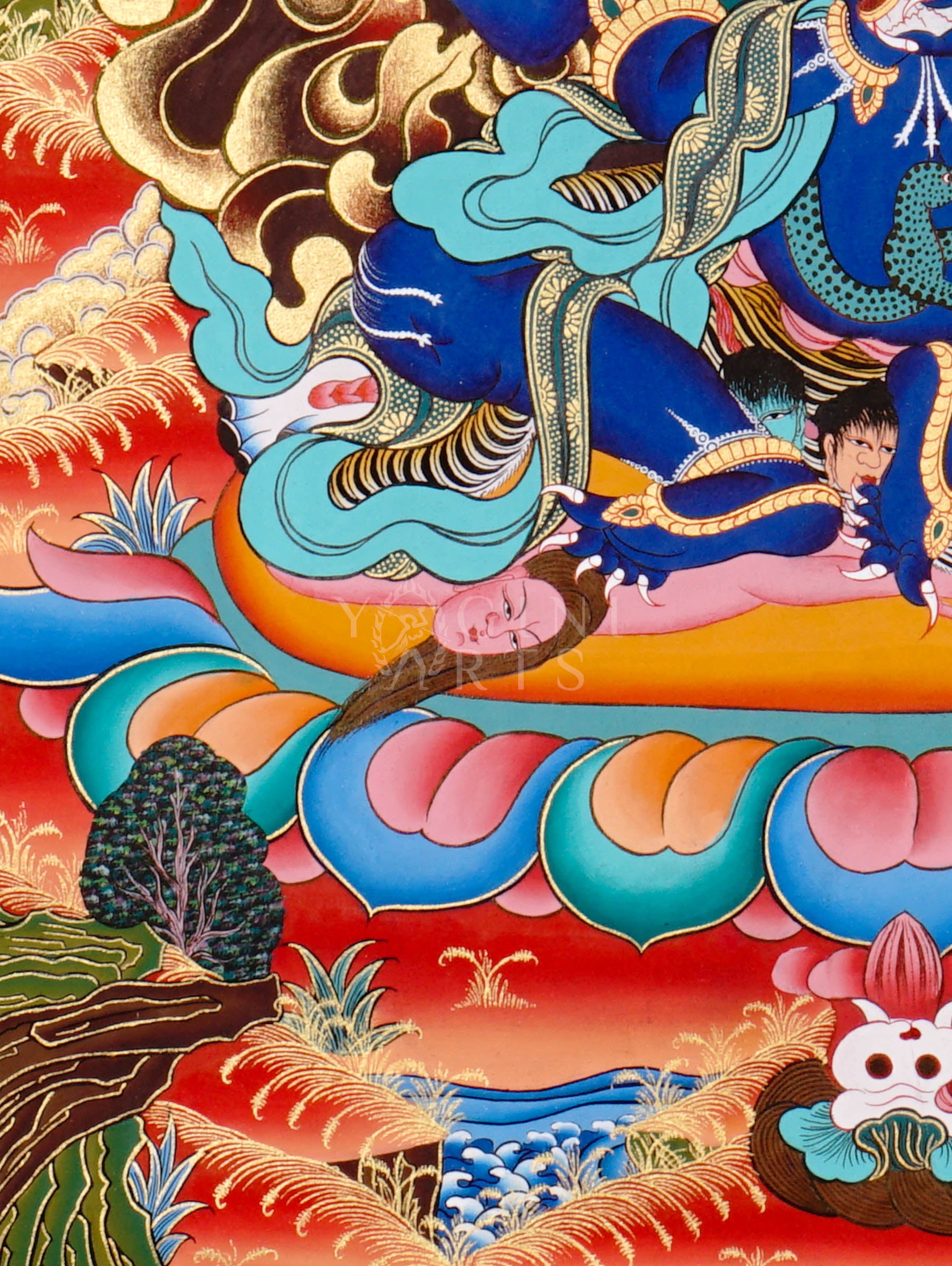 Mahakala thangka showing a fierce blue wrathful deity with multiple arms, surrounded by flames and standing on subdued figures in traditional Tibetan style.