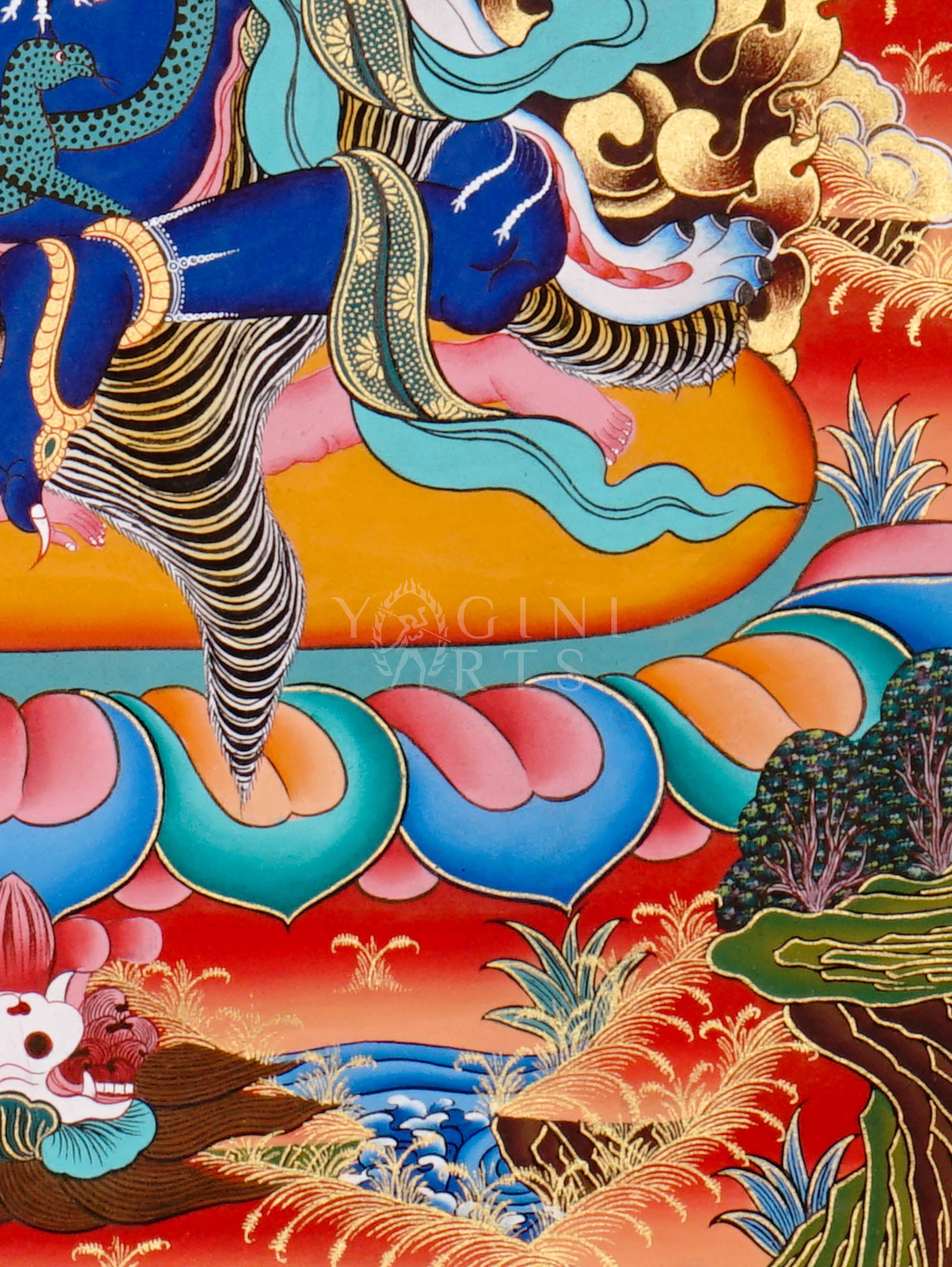 Mahakala thangka showing a fierce blue wrathful deity with multiple arms, surrounded by flames and standing on subdued figures in traditional Tibetan style.