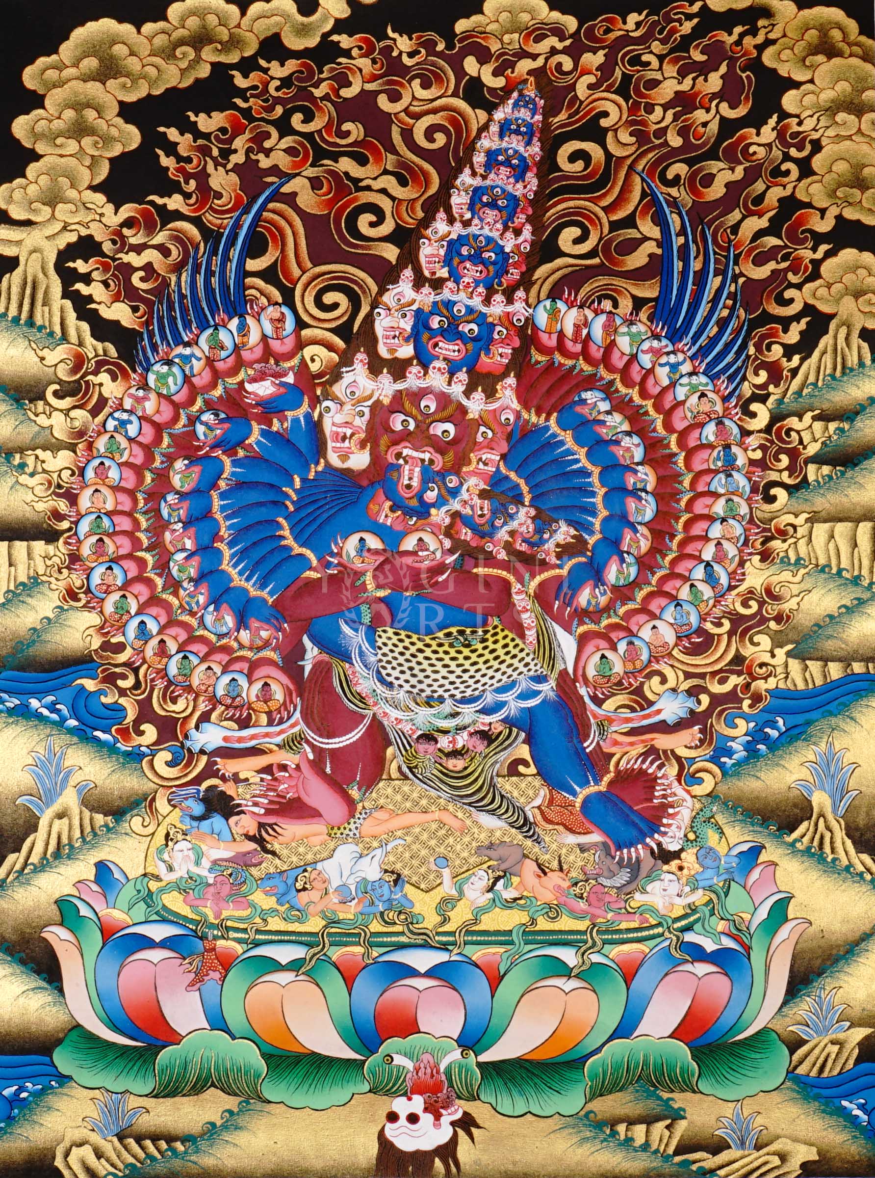 Heruka thangka showing a multi-headed, multi-armed wrathful tantric deity dancing on figures, surrounded by flames and intricate symbolic elements.