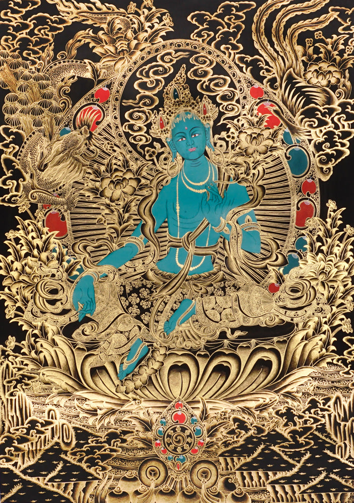 Gold-on-black Green Tara thangka showing the Buddhist goddess seated on a lotus throne surrounded by intricate gold floral and bird motifs.
