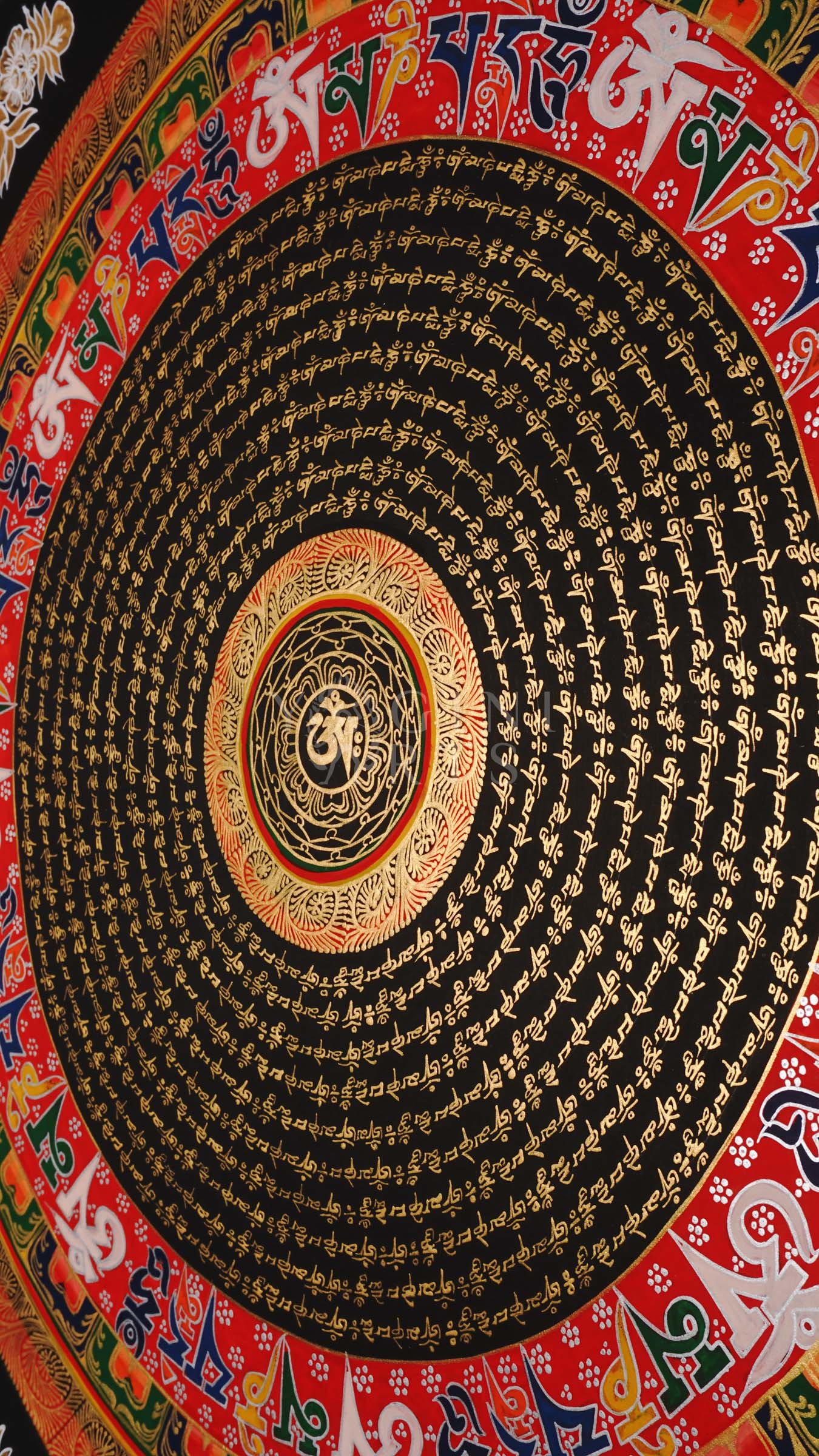 Tibetan mantra mandala thangka with black background, gold script rings, bold red outer mantra band, and floral corner decorations.