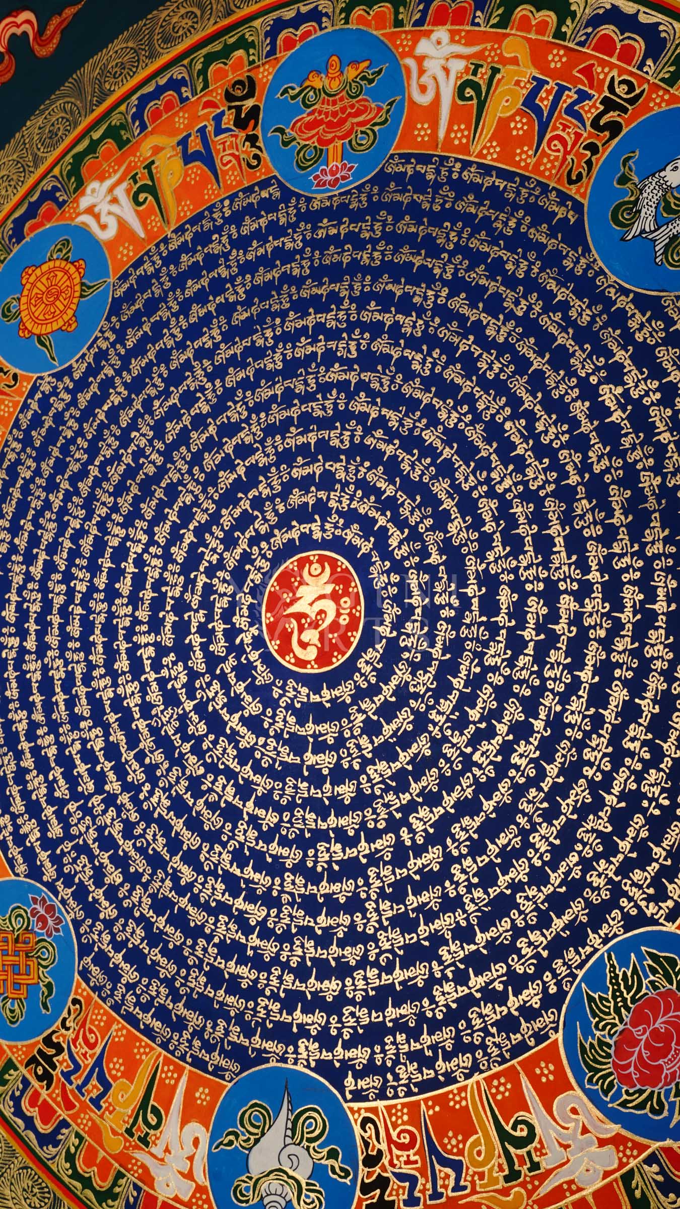 Tibetan mantra mandala thangka with blue center, gold script rings, orange band featuring eight auspicious symbols, and ornate golden border.
