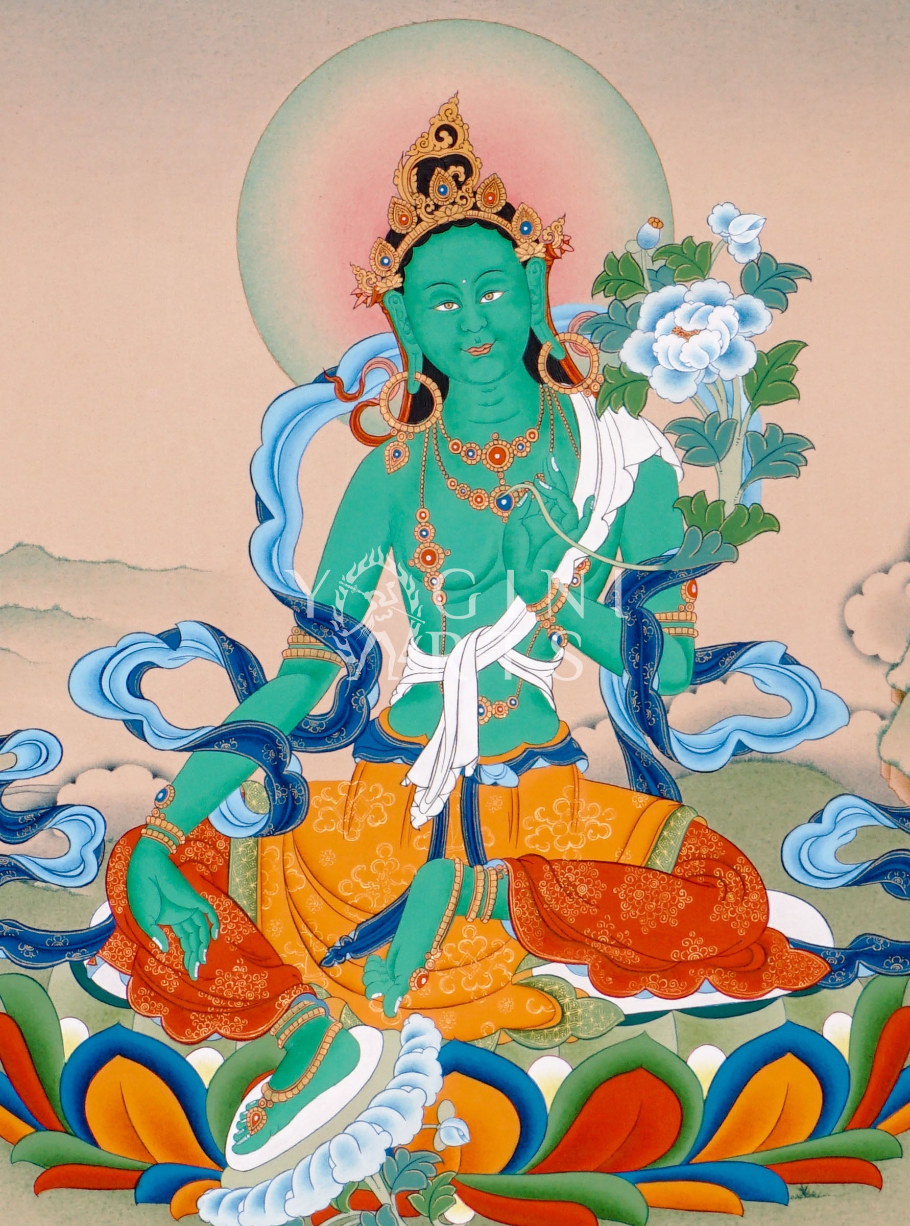 Hand-painted Green Tara thangka featuring the Tibetan Buddhist goddess seated on a lotus throne holding a blue lotus flower in a peaceful Himalayan landscape