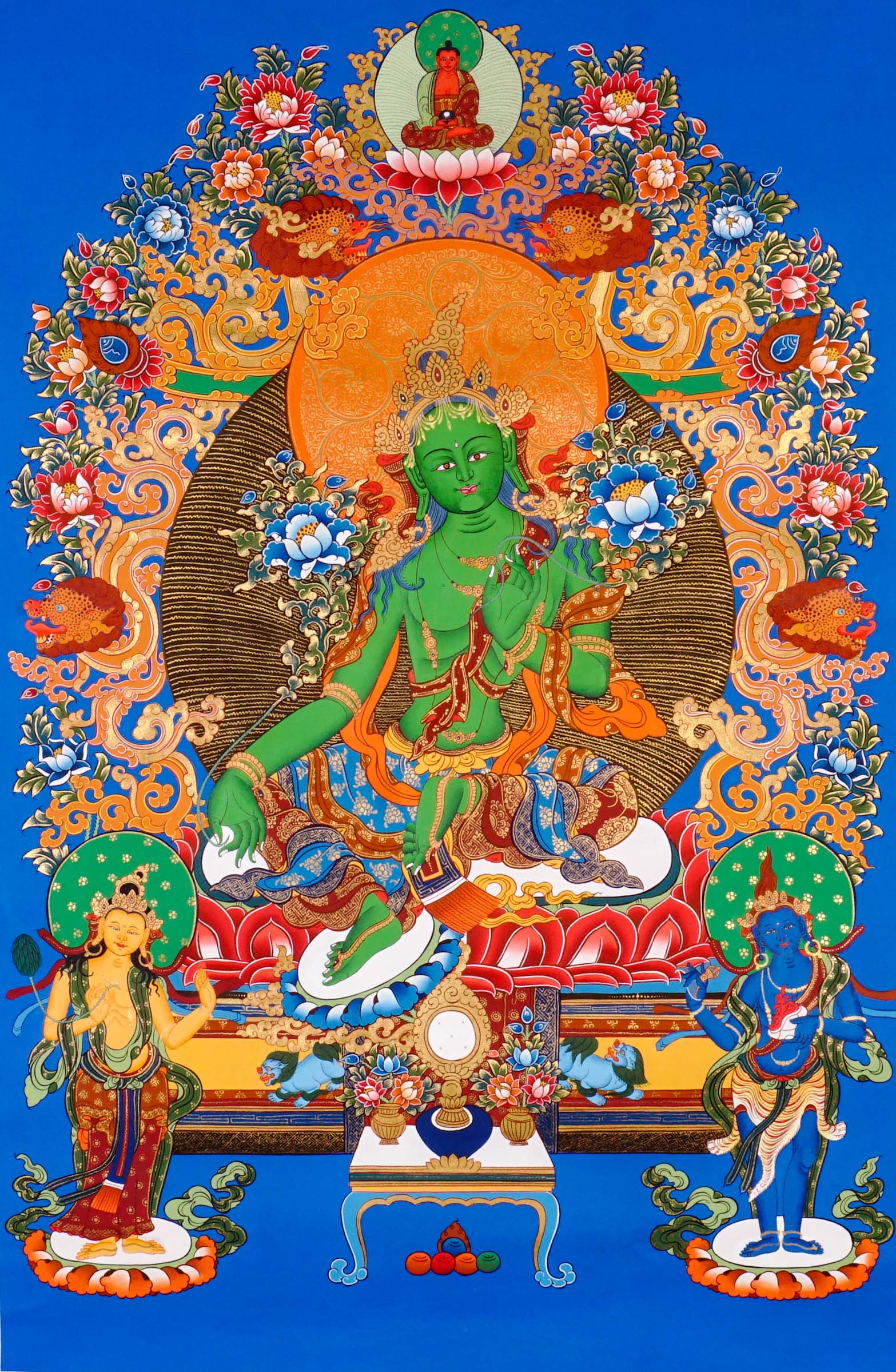 Hand-painted Green Tara thangka featuring the Tibetan Buddhist goddess seated on a lotus throne surrounded by sacred floral motifs and celestial symbolism