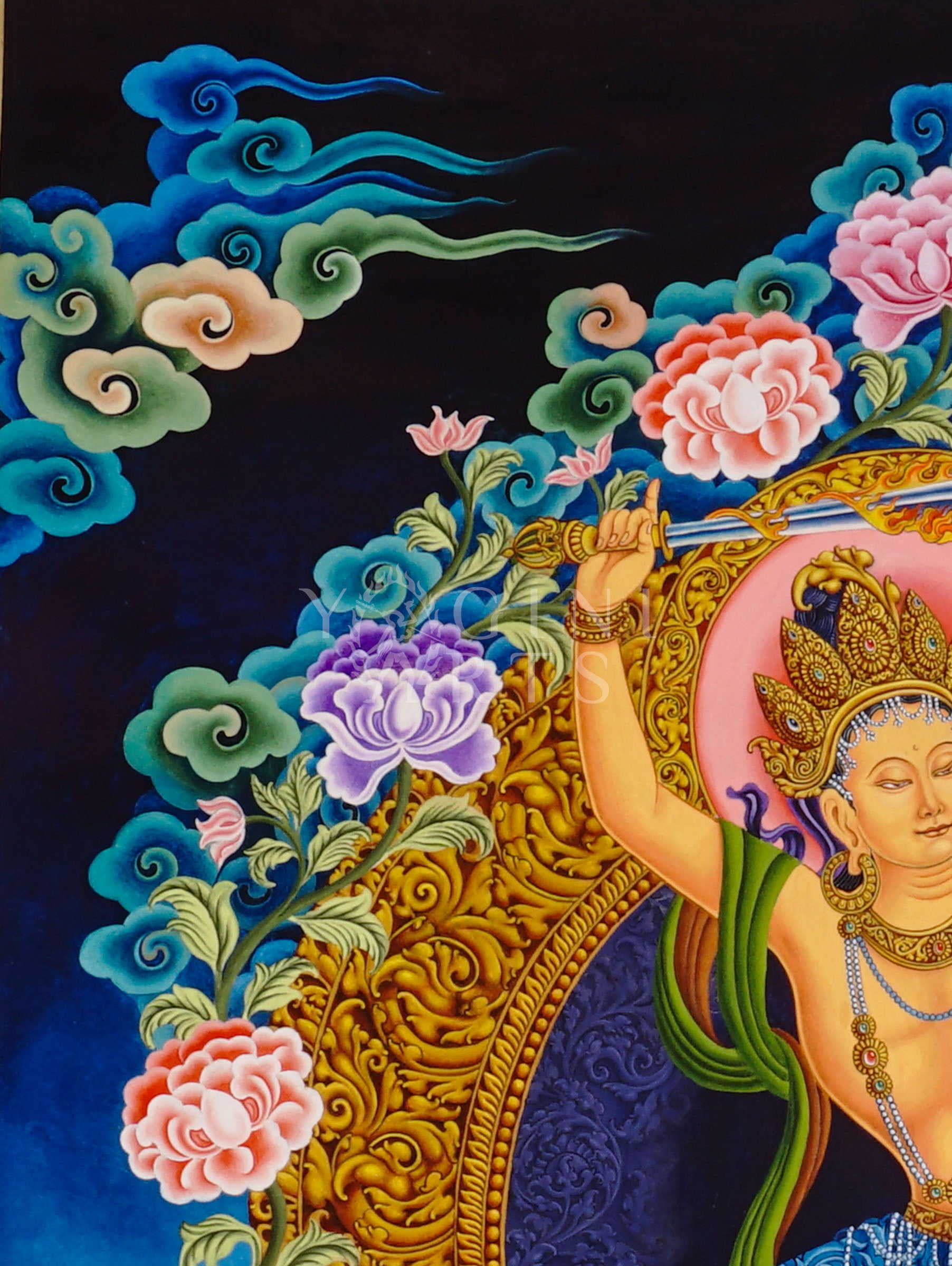 Newari Manjushree Tibetan thangka featuring the dancing Bodhisattva of Wisdom holding a flaming sword above a lotus throne with ornate floral designs