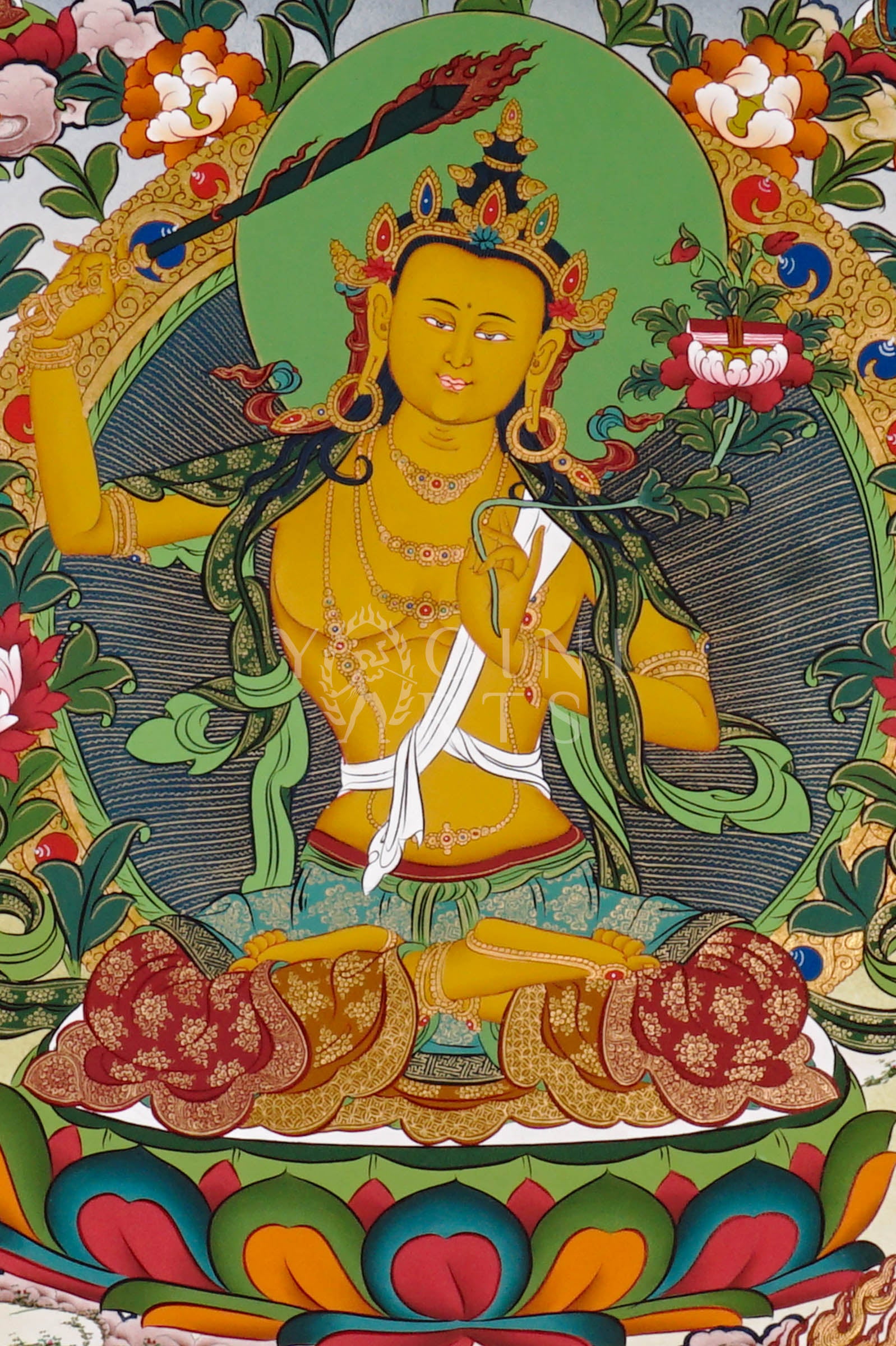 Tibetan Manjushree thangka featuring the Bodhisattva of Wisdom holding a flaming sword and lotus with Prajnaparamita scripture surrounded by Buddhist deities