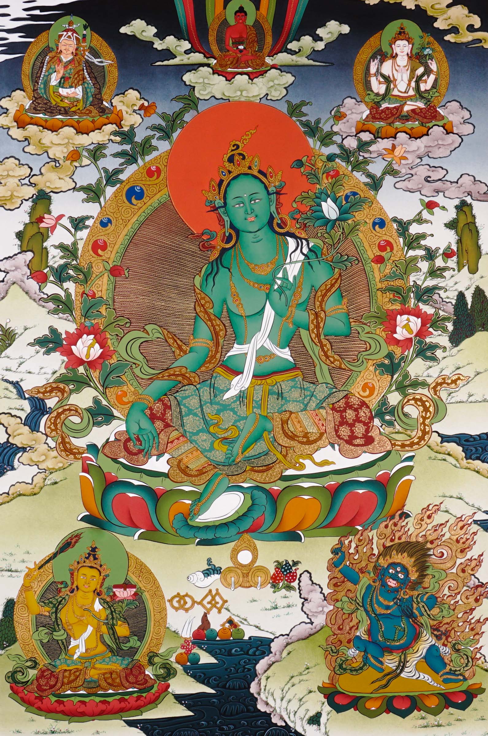 Hand-painted Tibetan Green Tara thangka featuring the Buddhist goddess seated on a lotus throne surrounded by sacred deities and floral Himalayan scenery