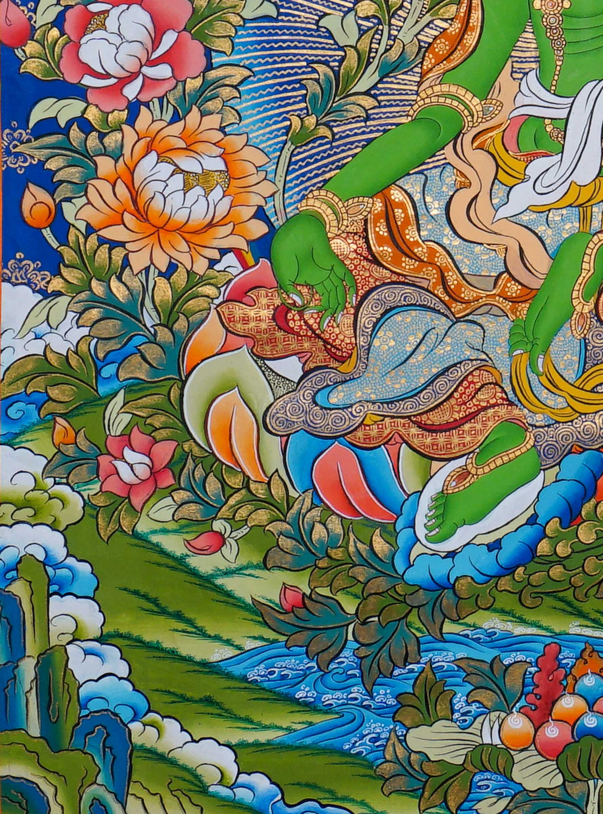 Green Tara Thangka painting depicting Green Tara seated on a lotus throne surrounded by flowers, clouds and intricate traditional Tibetan Buddhist artwork from Nepal