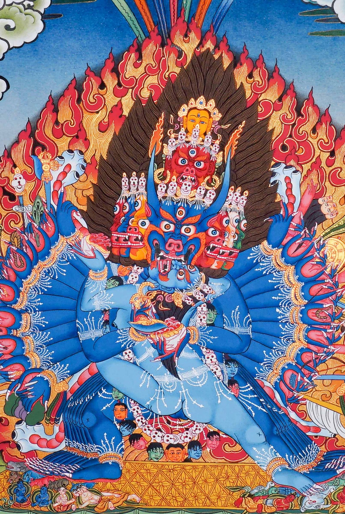 Yamantaka Thangka painting depicting the wrathful Buddhist deity surrounded by flames, symbolic figures, lotus petals and Himalayan landscape in traditional Tibetan Buddhist art from Nepal