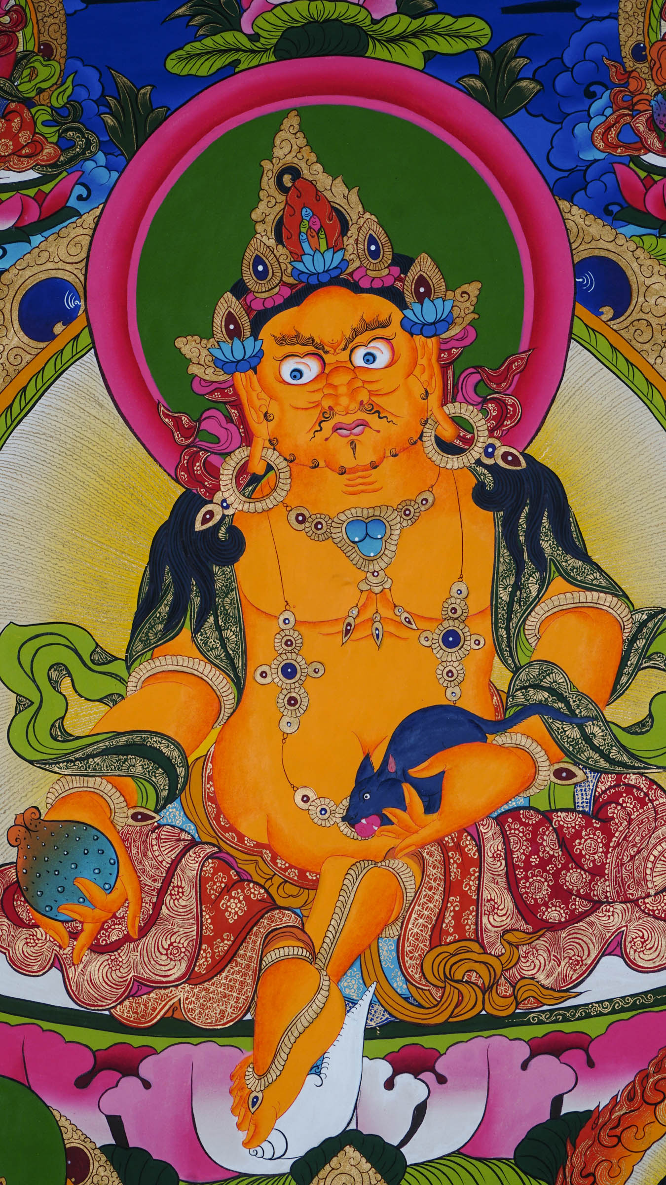 Tibetan Buddhist thangka painting of Yellow Zambala (Jambhala), hand-painted in Nepal with natural mineral pigments and 24k gold, surrounded by four Zambala forms in each corner.