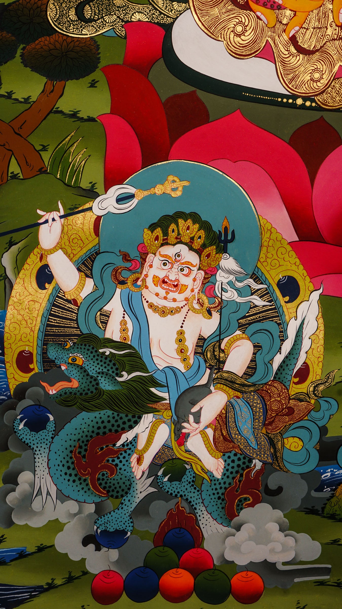 Zambala is a Tibetan Buddhist deity of wealth and prosperity. This genuine hand-painted thangka shows him holding a jewel-spouting mongoose and citron fruit, symbols of abundance and success. Made with natural mineral pigments on authentic canvas, this thangka attracts wealth, removes obstacles, and supports spiritual growth.
