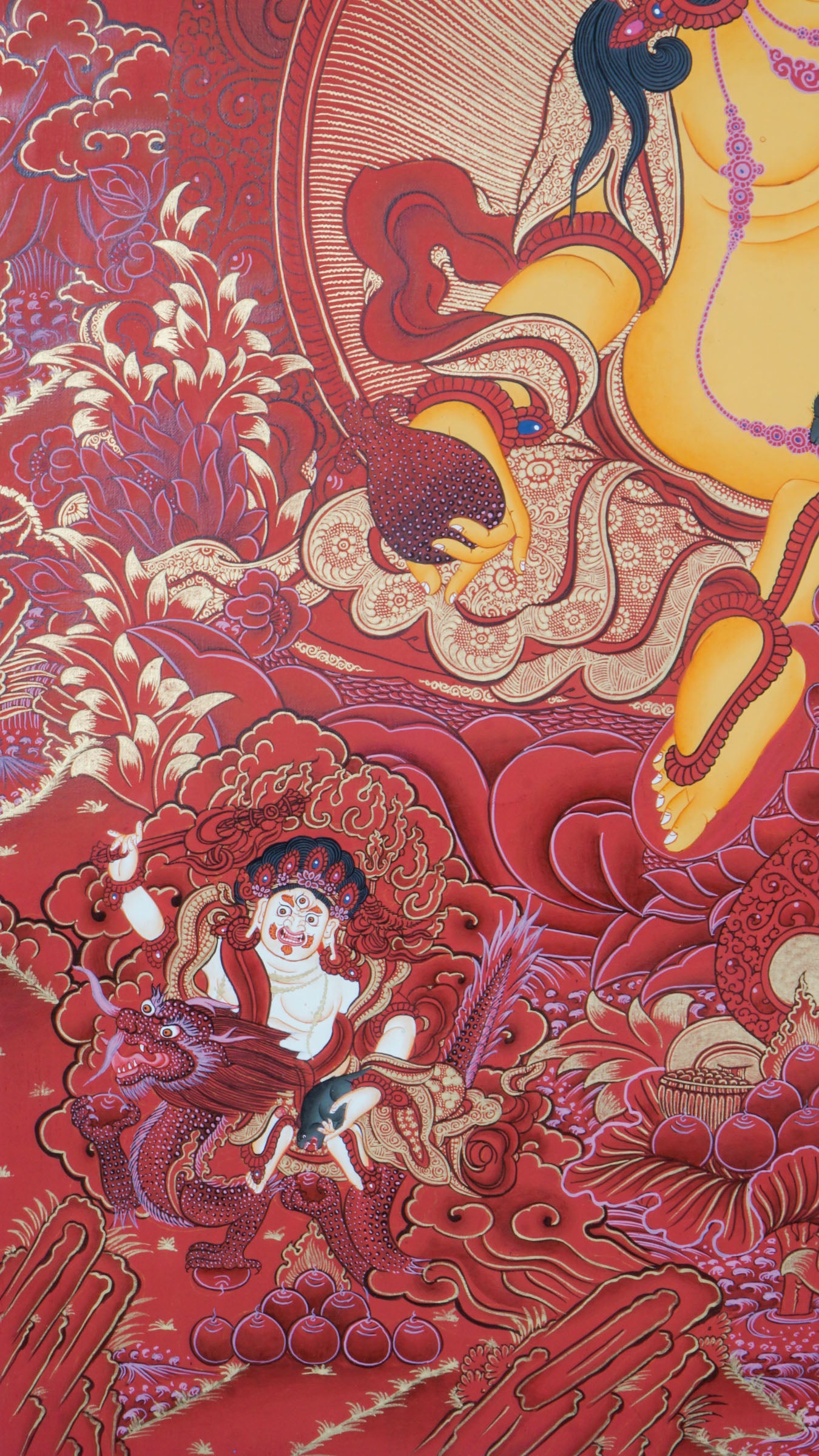 The Zambala Thangka is a genuine Tibetan Buddhist artwork symbolizing wealth, abundance, and protection. Hand-painted with vibrant colors, this authentic thangka attracts prosperity and spiritual growth, making it a powerful addition to your sacred space.