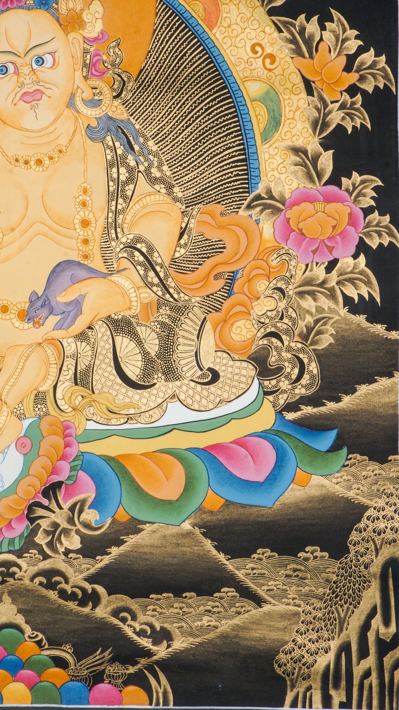 Zambala is a Tibetan Buddhist deity of wealth and prosperity. This genuine Thangka shows him seated on a lotus throne, holding a jewel-spouting mongoose and a symbol of fulfillment.