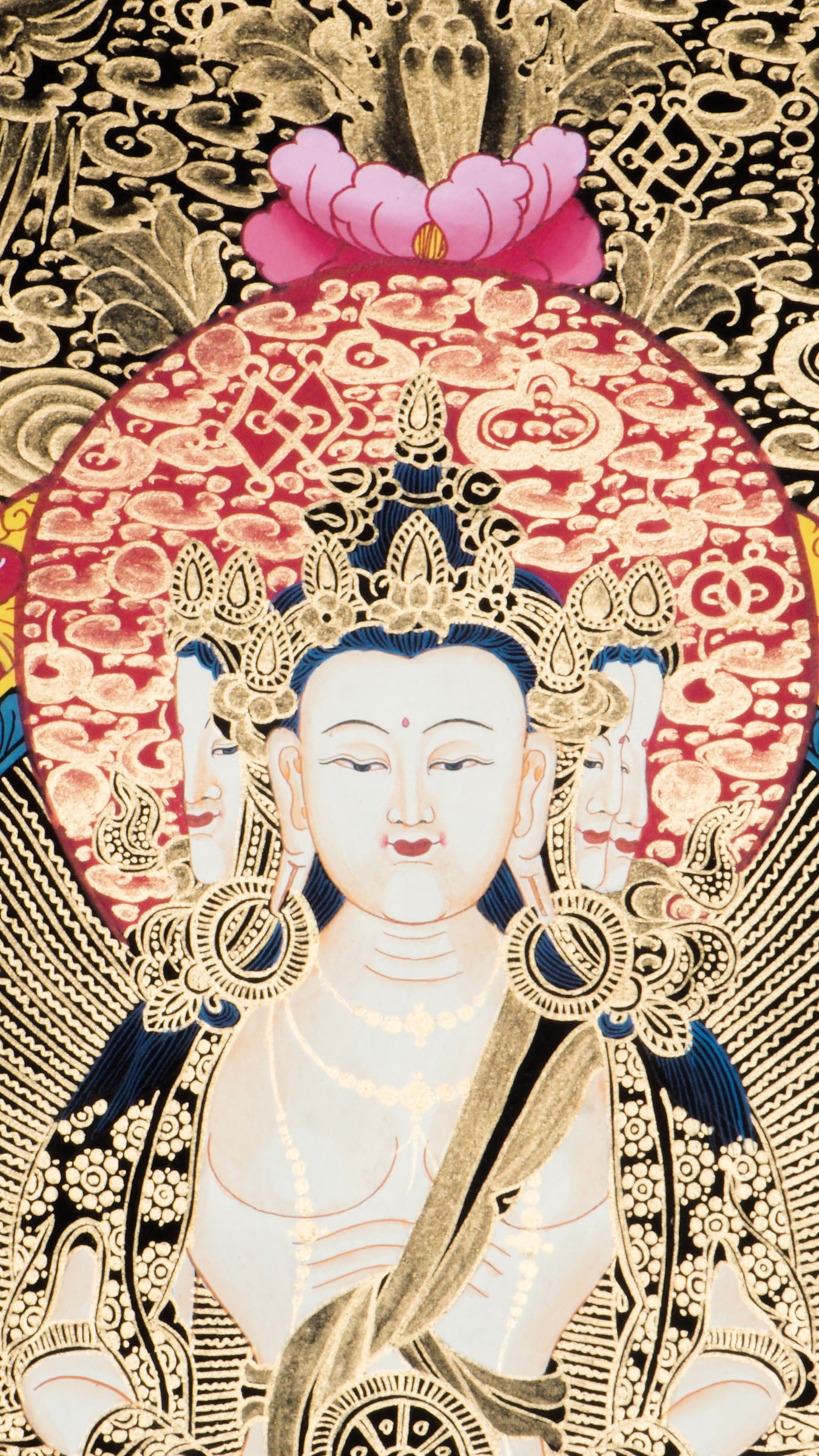 Hand-painted three-faced Vairocana Buddha thangka with 24k gold detailing seated in meditation with serene white form and sacred ornaments.