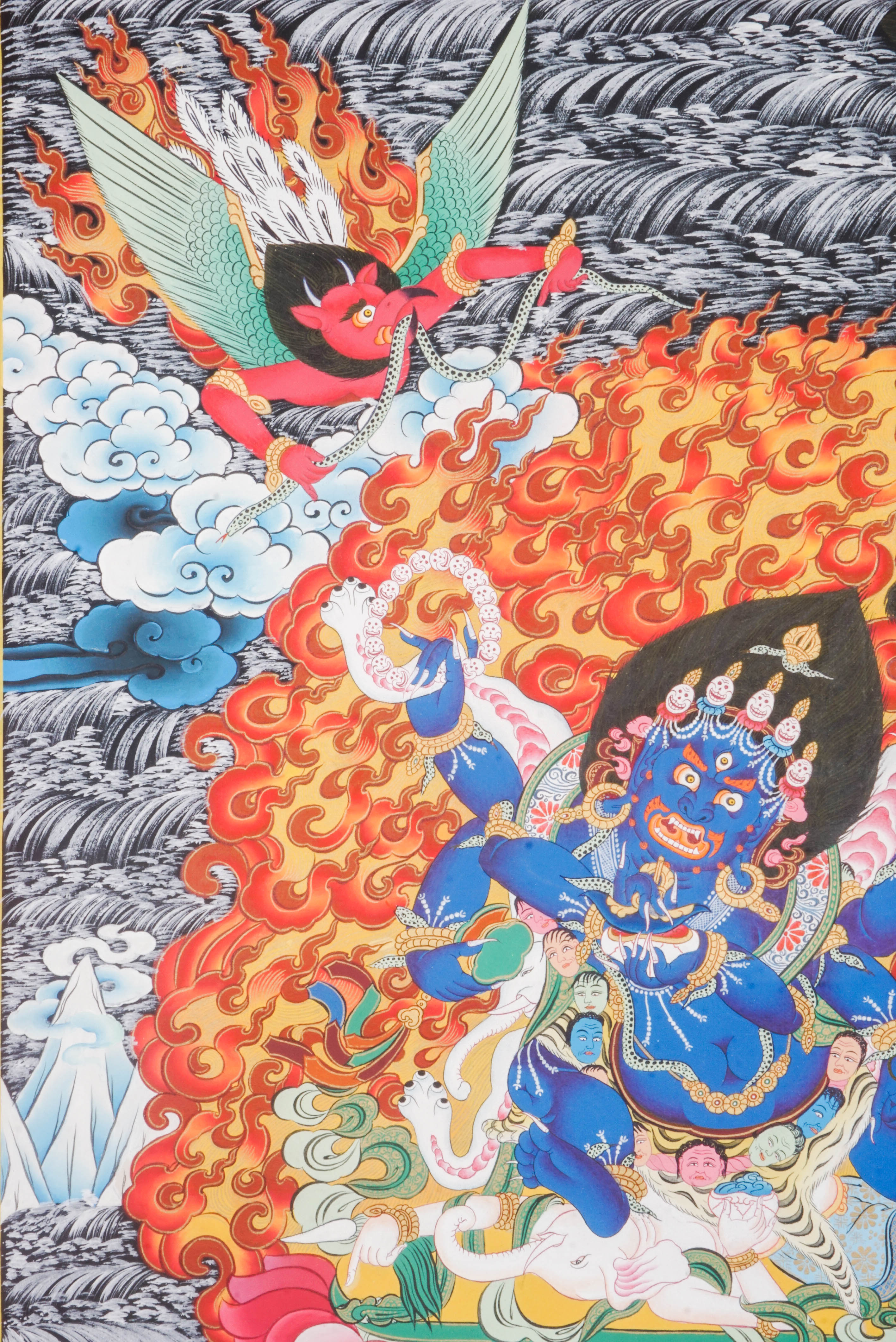 The 6-Hand Mahakala Thangka symbolizes fierce protection and obstacle removal, hand-painted with vibrant pigments and gold leaf for spiritual strength and presence.