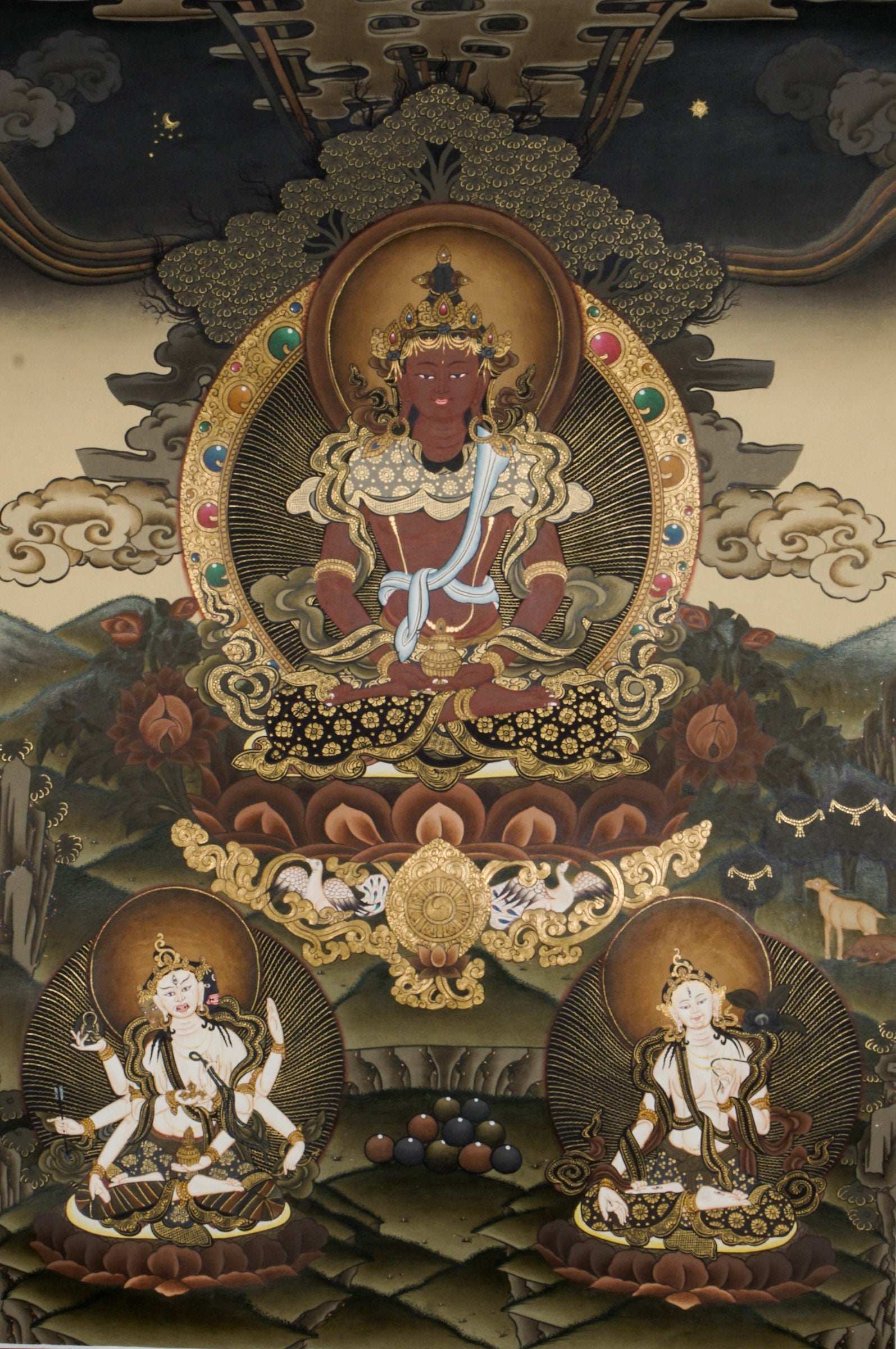 Amitayus Thangka - a sacred hand-painted thangka symbolizing endless life and kindness, sitting peacefully on a lotus throne.