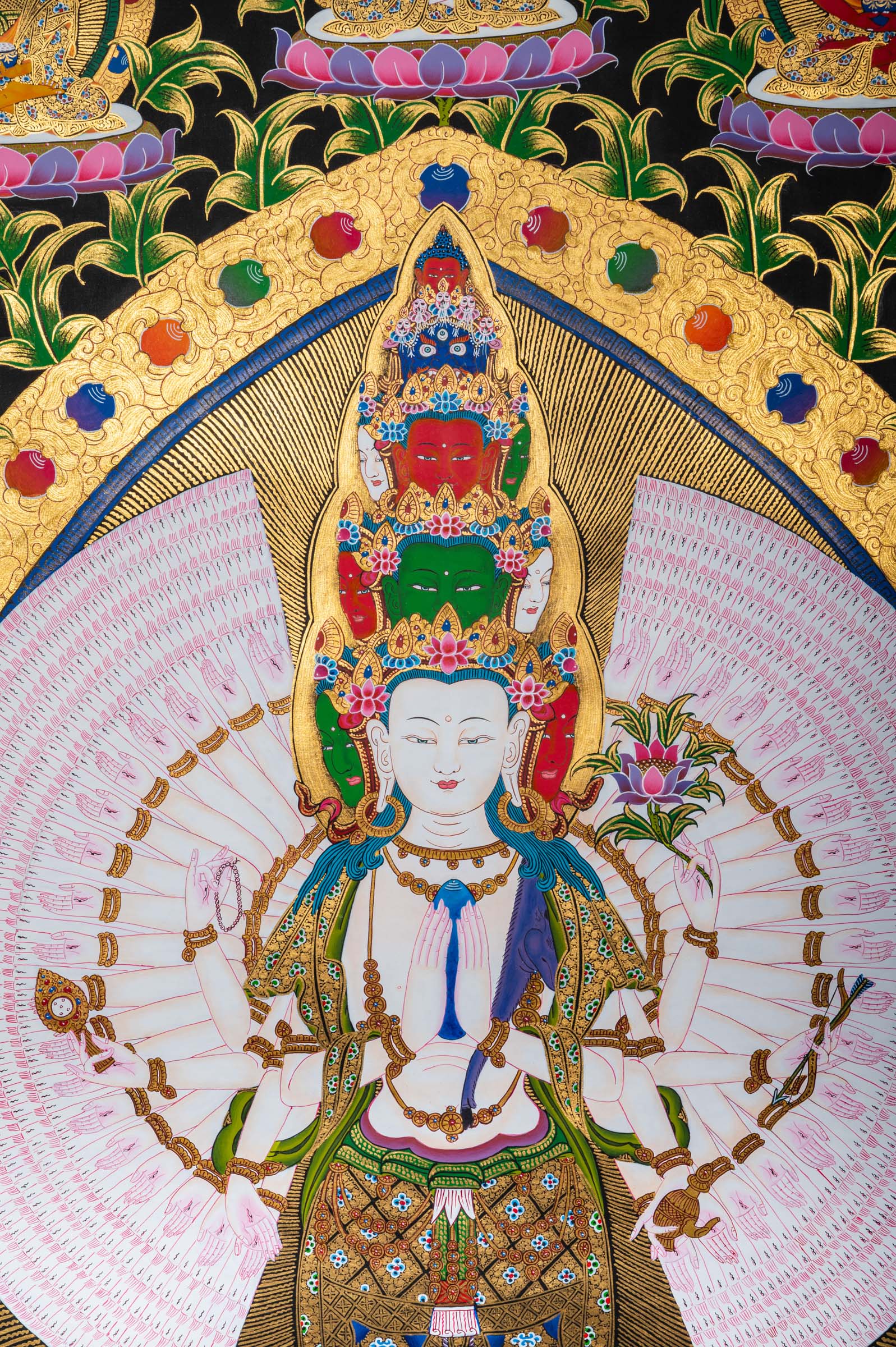 Open your heart to compassion with this exclusive Avalokiteshvara Thangka. Featuring the Bodhisattva with symbolic arms and sacred items, it brings compassion, peace and protection to your space. 