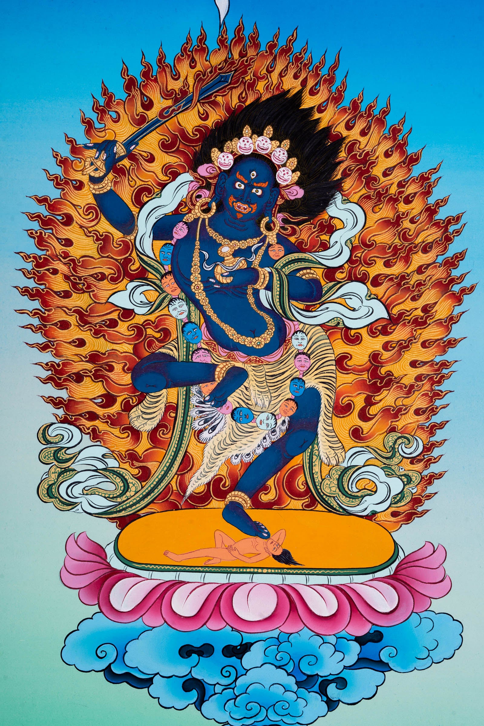 This genuine Tibetan Thangka of Black Manjushri, hand-painted with natural mineral pigments, represents the fierce wisdom that swiftly removes ignorance and obstacles on the path to enlightenment. A powerful Buddhist artwork, it enhances any sacred space with transformative energy and deep spiritual meaning.