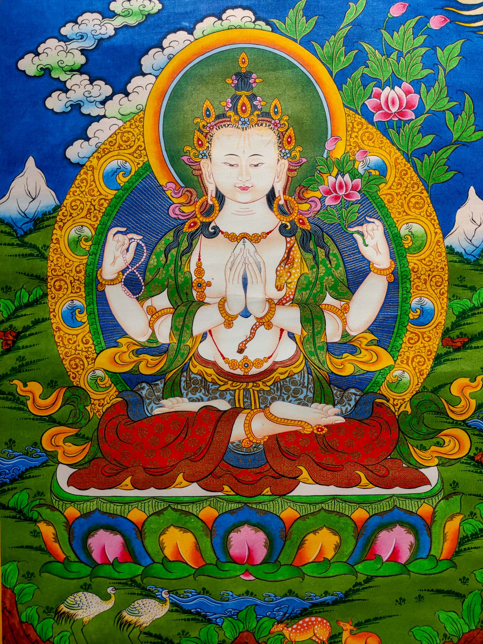 This Handmade Tibetan Thangka Painting of Chengresi is a stunning piece of art, crafted by skilled Tibetan artisans.