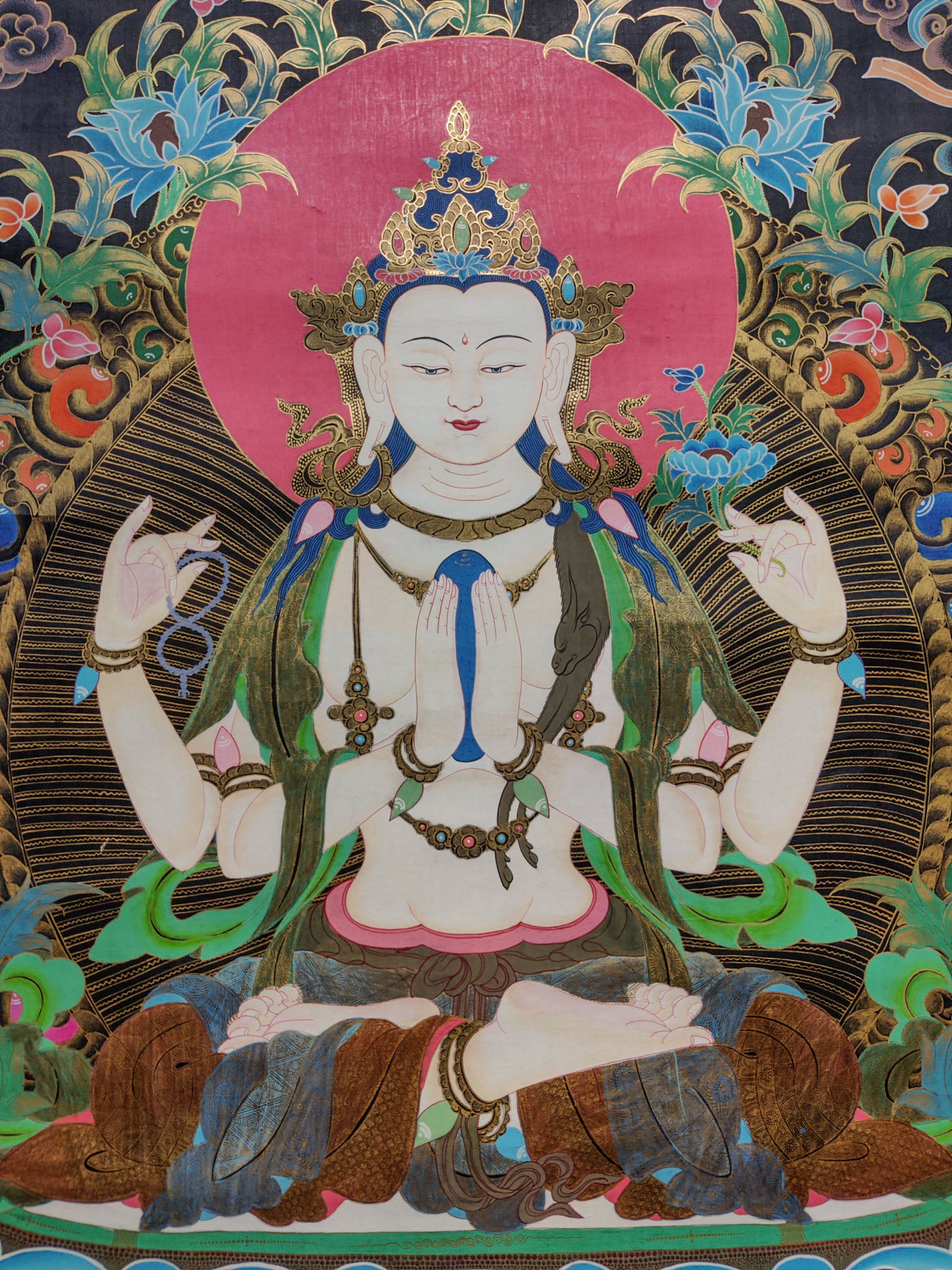 The Chenrezig Thangka painting is a deeply revered masterpiece of Tibetan cultural art, intricately crafted by skilled local artisans.