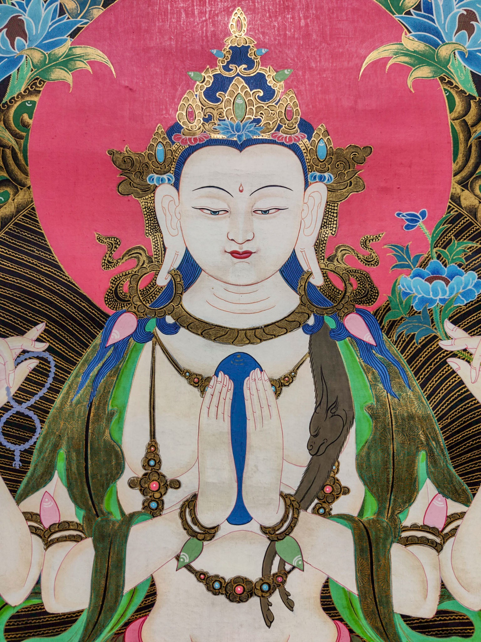 The Chenrezig Thangka painting is a deeply revered masterpiece of Tibetan cultural art, intricately crafted by skilled local artisans.