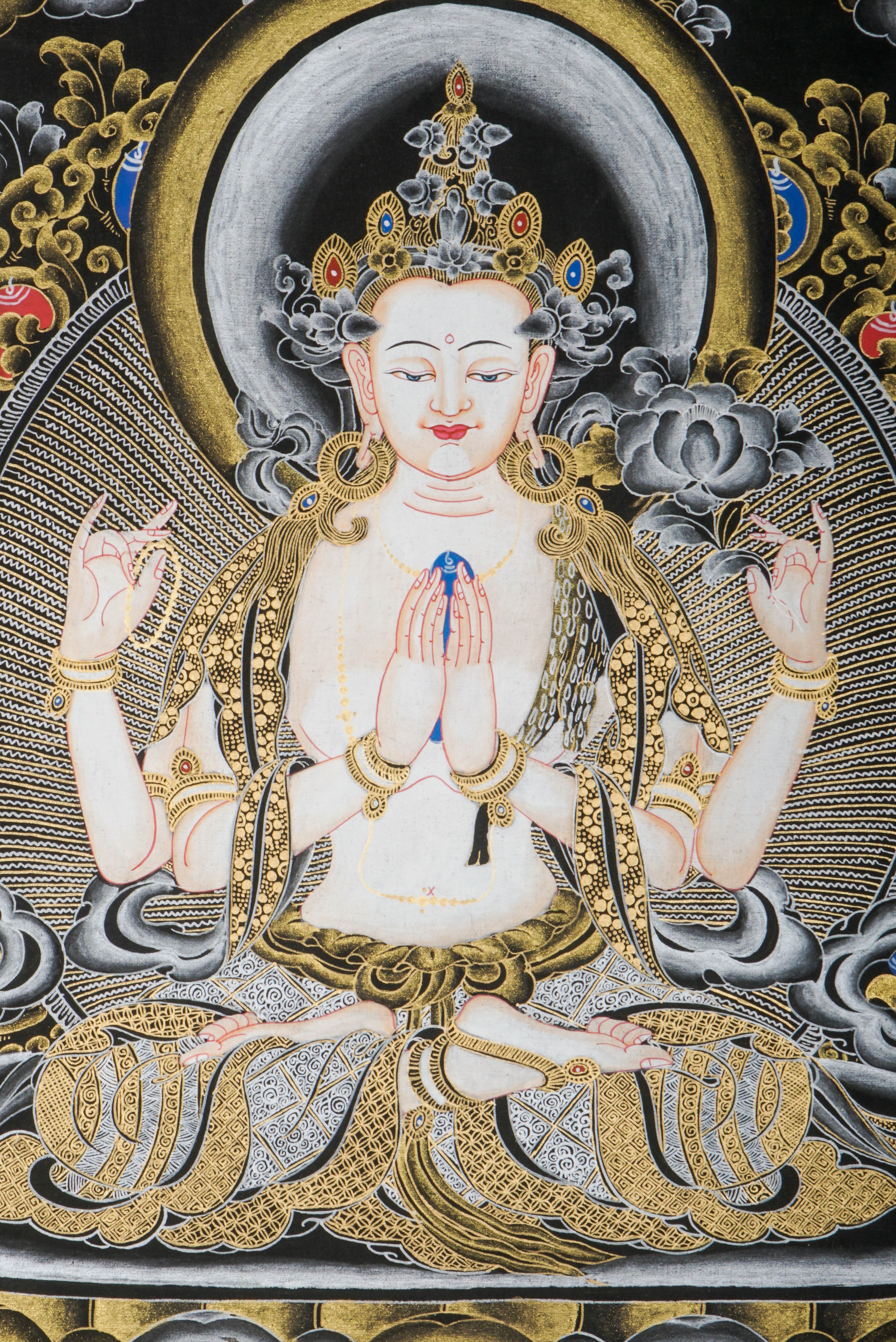 This genuine Tibetan Chenrezig Thangka, hand-painted with natural pigments, radiates compassion and serenity—perfect for inviting peace and loving energy into your space.